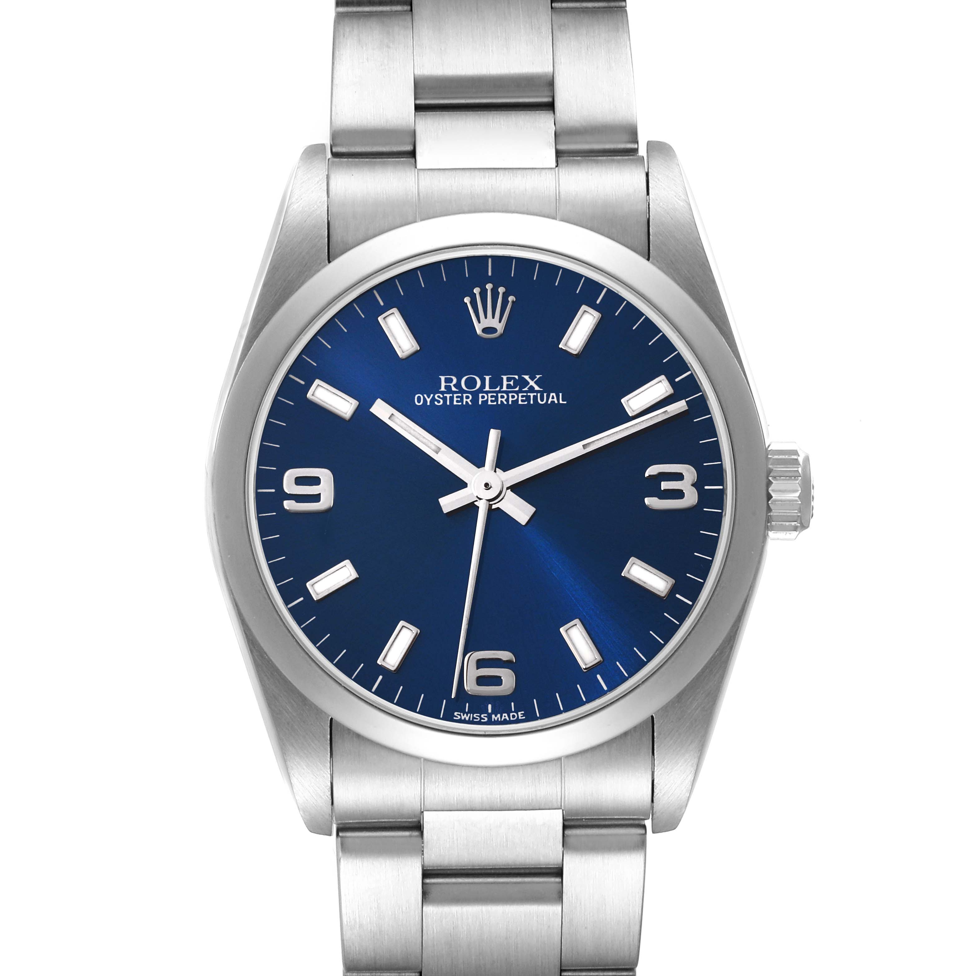 This image shows the front view of a Rolex Mid-Size 77080 Women
s Stainless Steel Blue Dial 77080 Women
s Stainless Steel Blue Dial Oyster Perpetual watch with a blue dial.