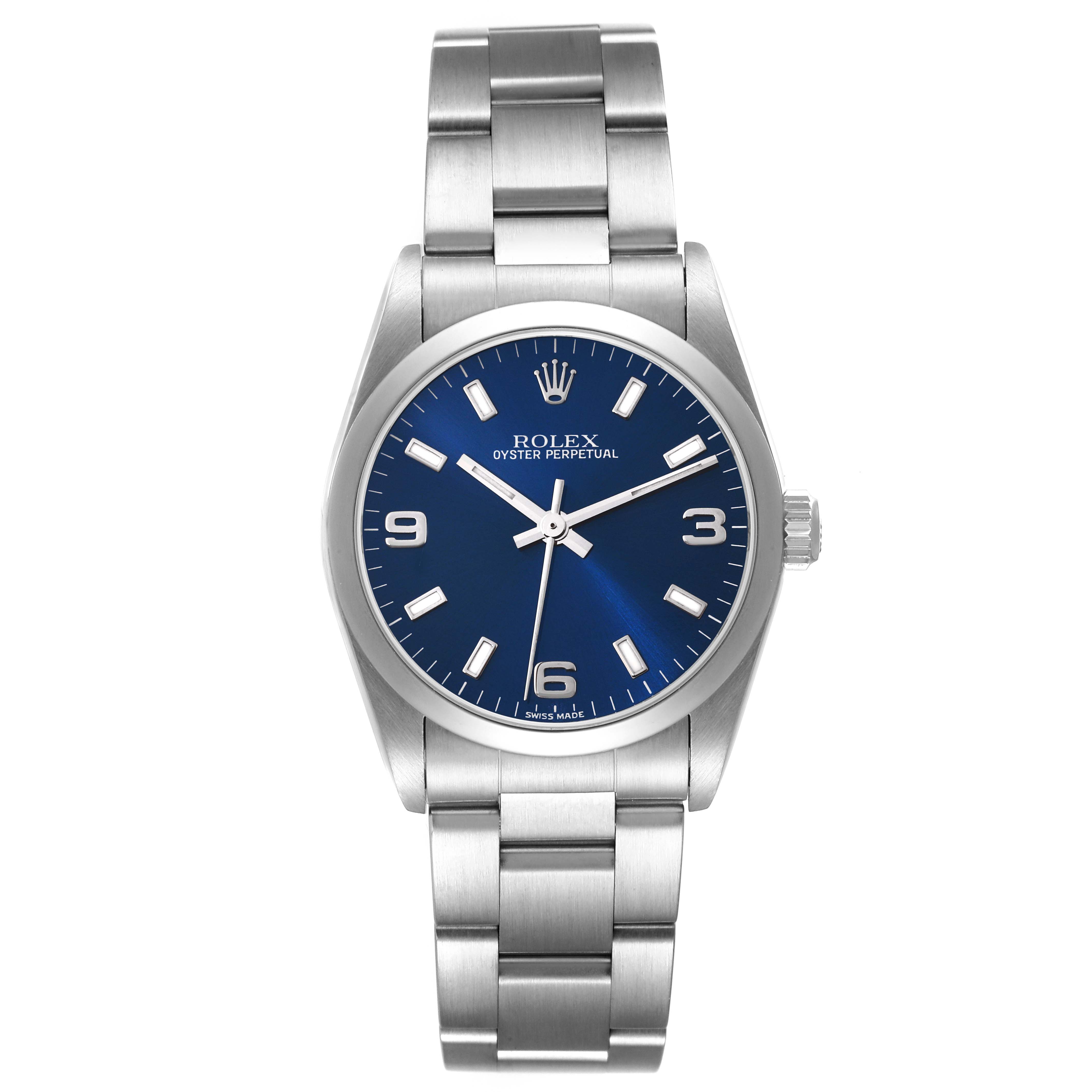 The image shows a front view of a Mid-Size Rolex Oyster Perpetual watch with a blue dial and a stainless steel bracelet.