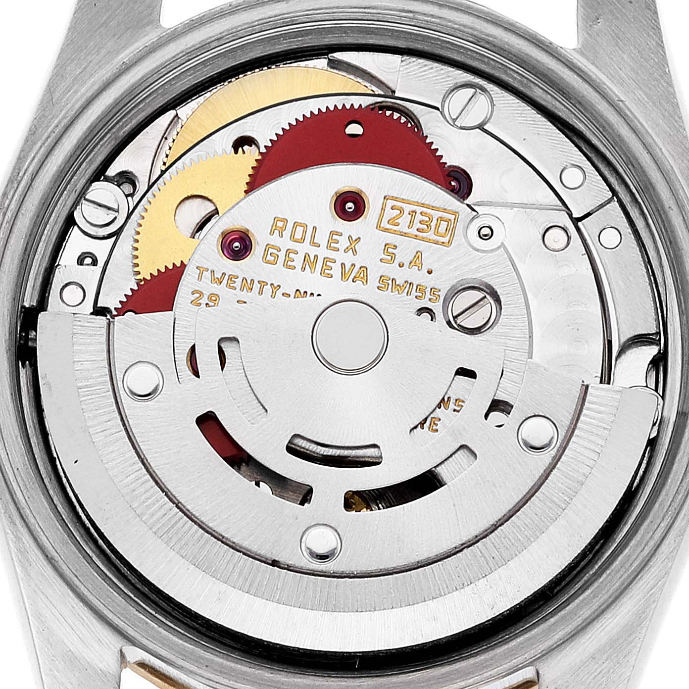 This image shows the internal movement and mechanism of a Rolex Oyster Perpetual 67243 Women's Steel and Gold (two tone) Champagne Dial 67243 Women's Steel and Gold (two tone) Champagne Dial watch from a rear angle.