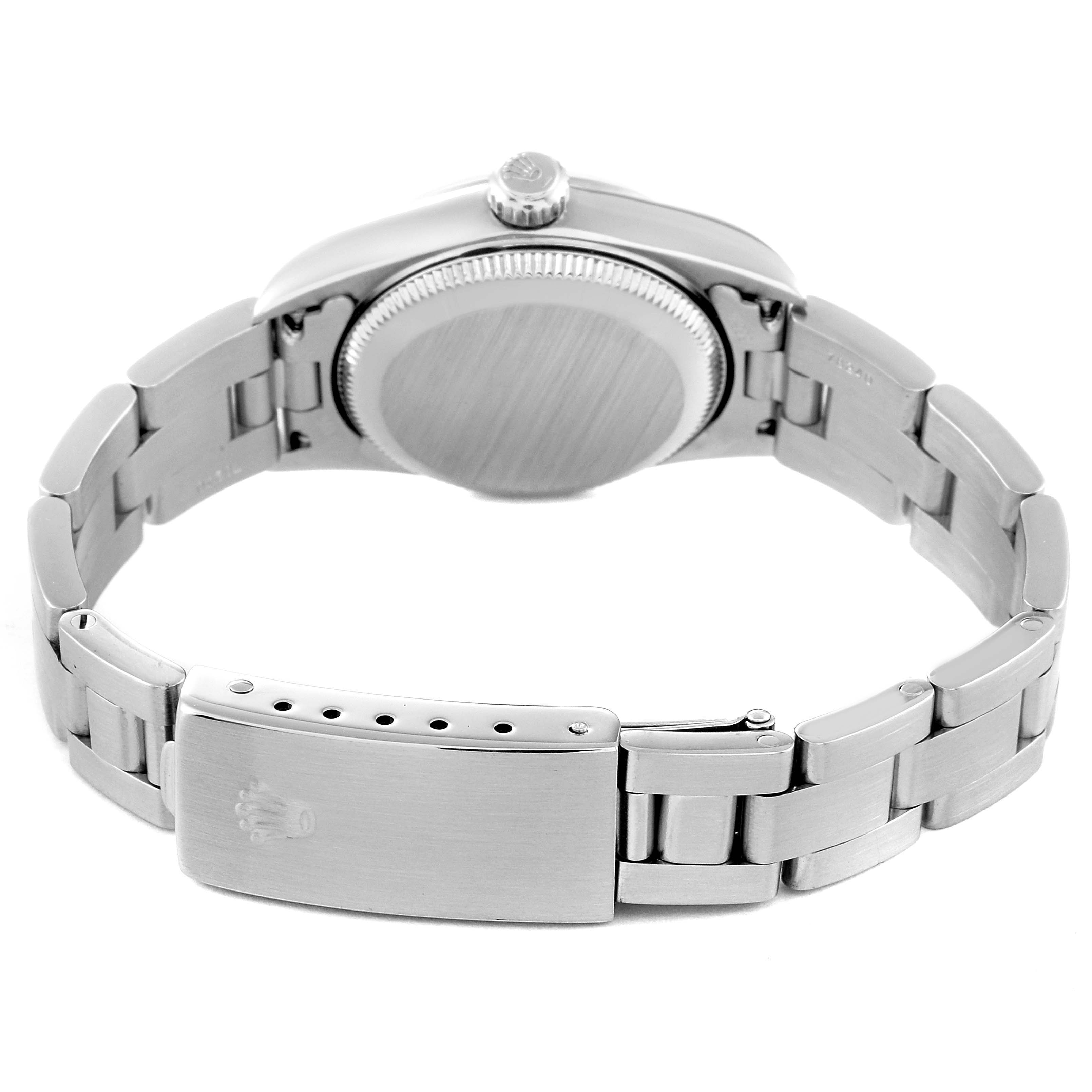 The image shows the back view of the Rolex Oyster Perpetual 76080 Women's Stainless Steel Silver Dial 76080 Women's Stainless Steel Silver Dial watch, including its closed clasp and bracelet.