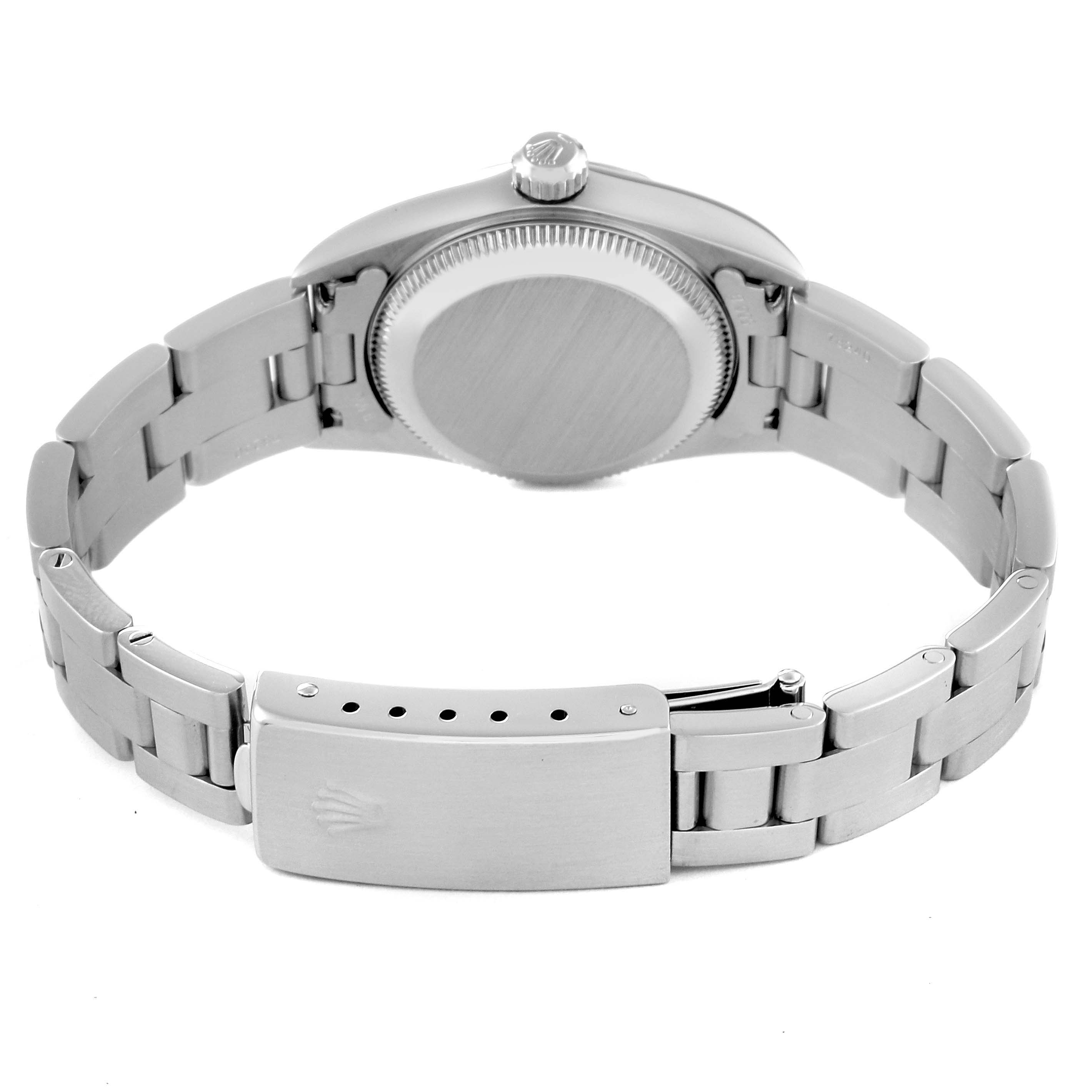 This image shows the back view of the Rolex Oyster Perpetual 76030 Women's Stainless Steel Pink Dial 76030 Women's Stainless Steel Pink Dial watch, including the case back, crown, and bracelet with the clasp open.