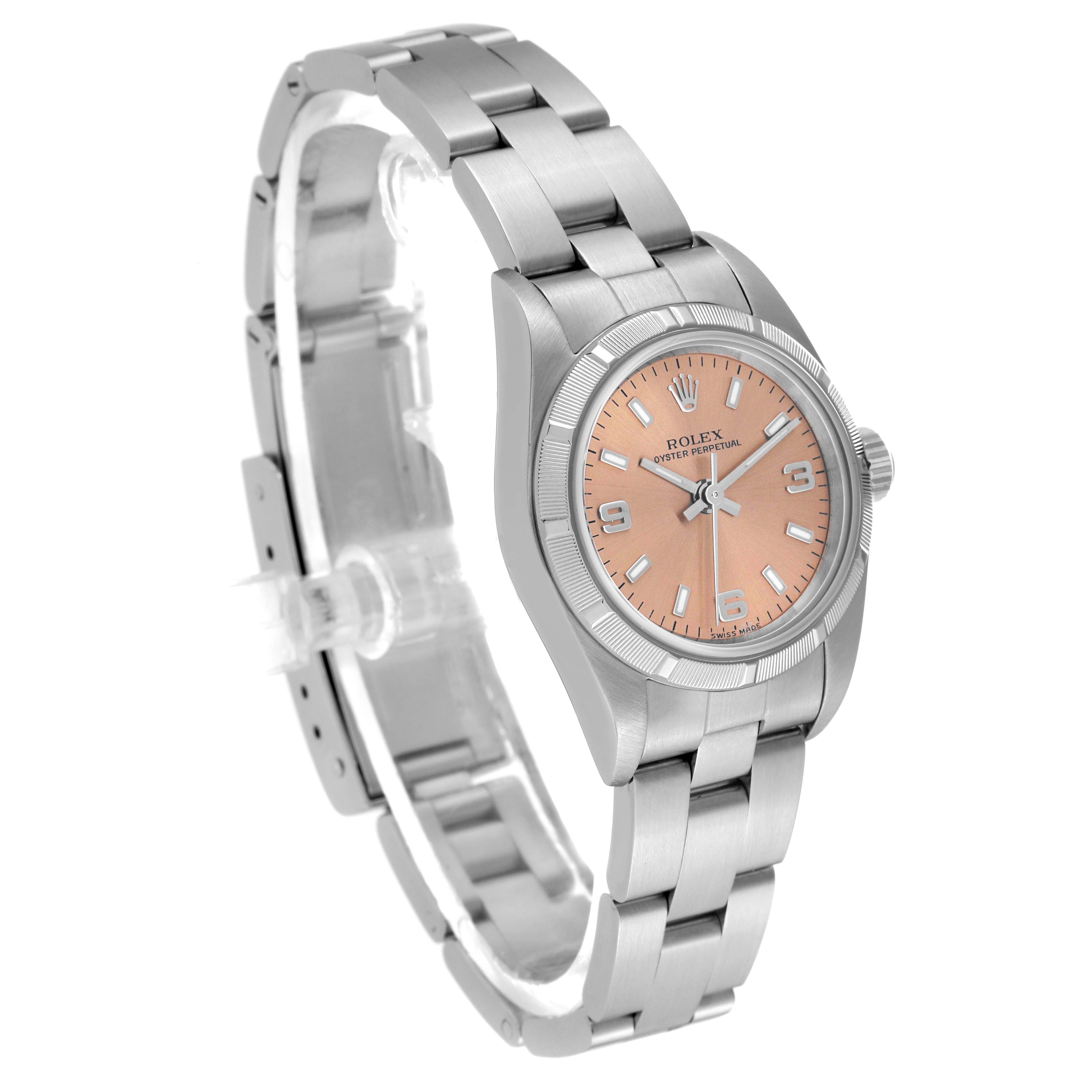 The image shows a side angle of a Rolex Oyster Perpetual 76030 Women's Stainless Steel Pink Dial 76030 Women's Stainless Steel Pink Dial watch, highlighting its bracelet, bezel, and dial.