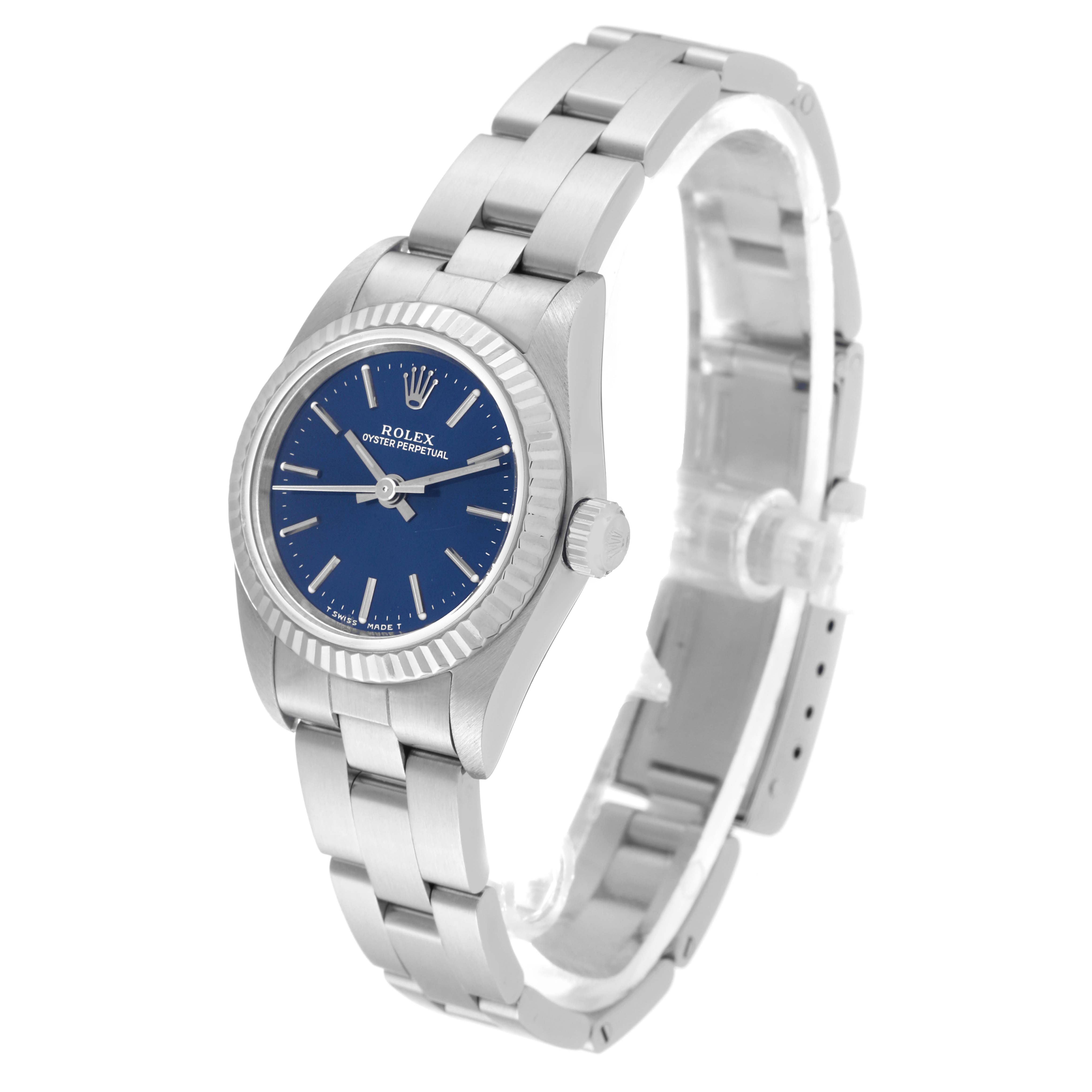 The Rolex Oyster Perpetual 76094 Women's Stainless Steel Blue Dial 76094 Women's Stainless Steel Blue Dial is shown at a three-quarter angle, highlighting its blue dial, crown, and stainless steel bracelet.