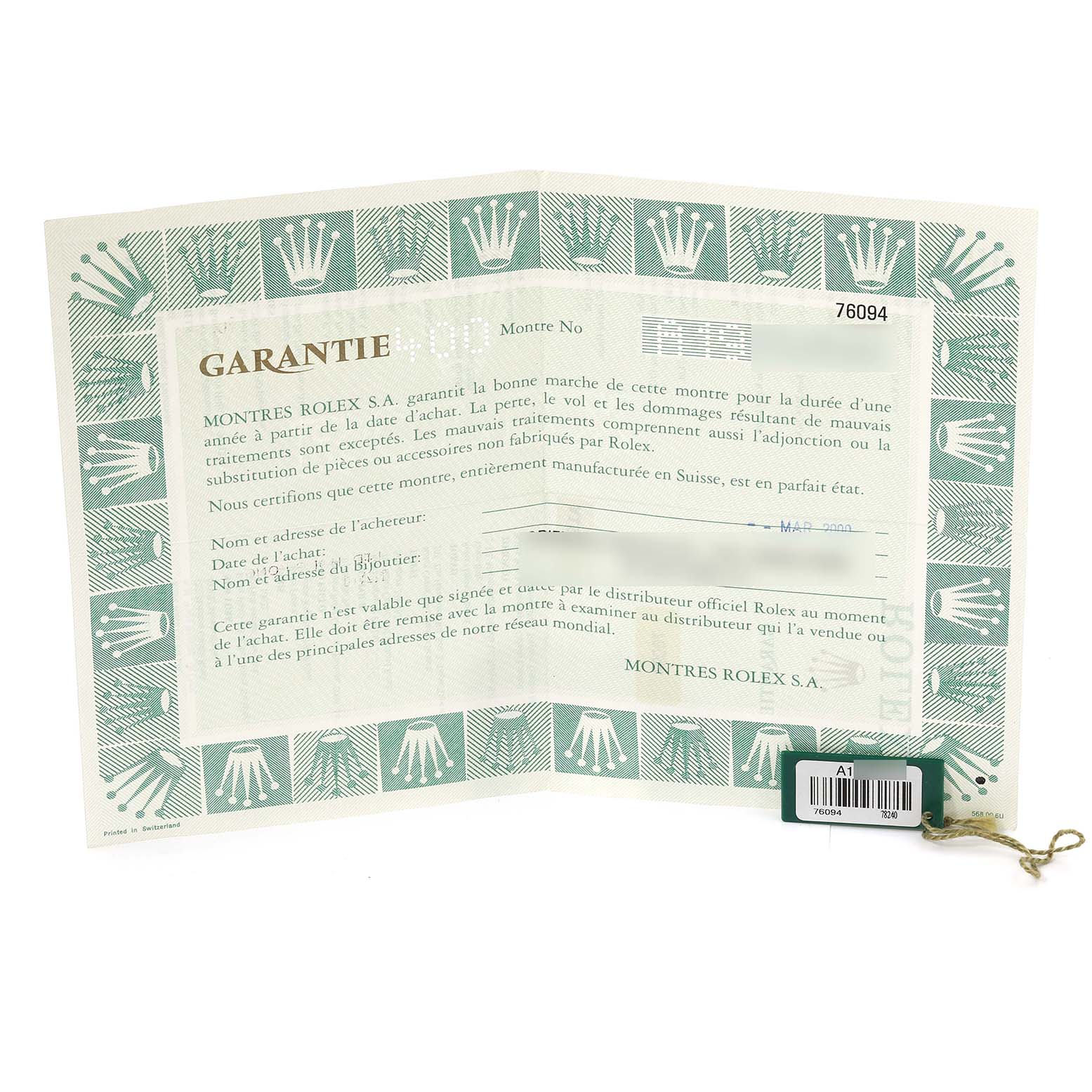 The image shows the guarantee certificate and tag for the Rolex Oyster Perpetual 76094 Women's Stainless Steel Blue Dial 76094 Women's Stainless Steel Blue Dial model.