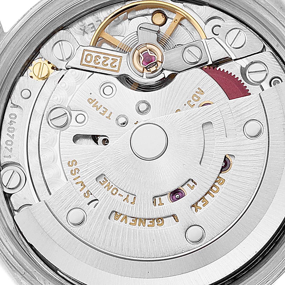 This image shows a close-up view of the inner mechanical movement of a Rolex Oyster Perpetual 76193 Women's Steel and Gold (two tone) Champagne Dial 76193 Women's Steel and Gold (two tone) Champagne Dial watch.