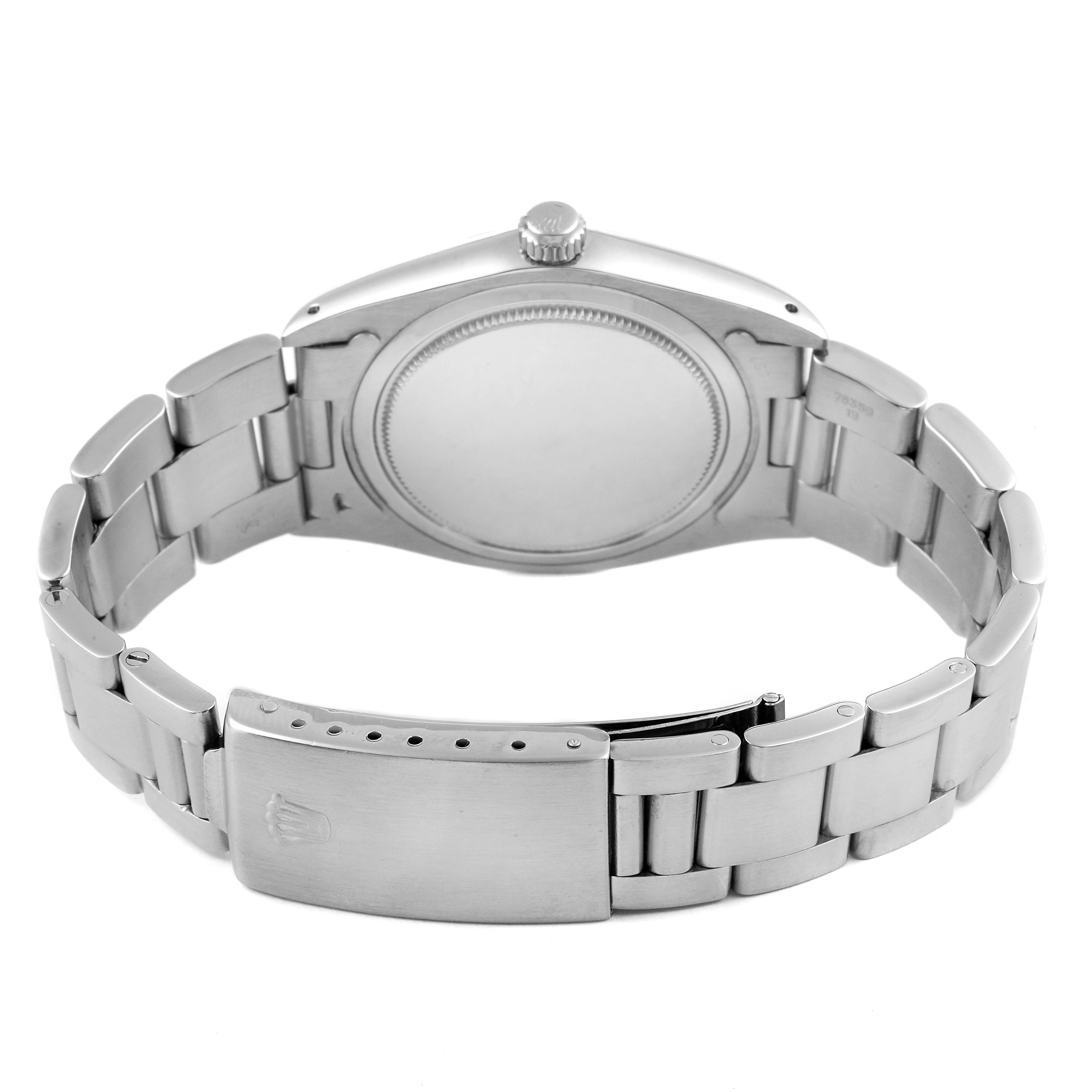 The image shows the back view of a Rolex Vintage Collection 6694 Men's Stainless Steel Black Dial 6694 Men's Stainless Steel Black Dial watch, highlighting the bracelet and clasp.