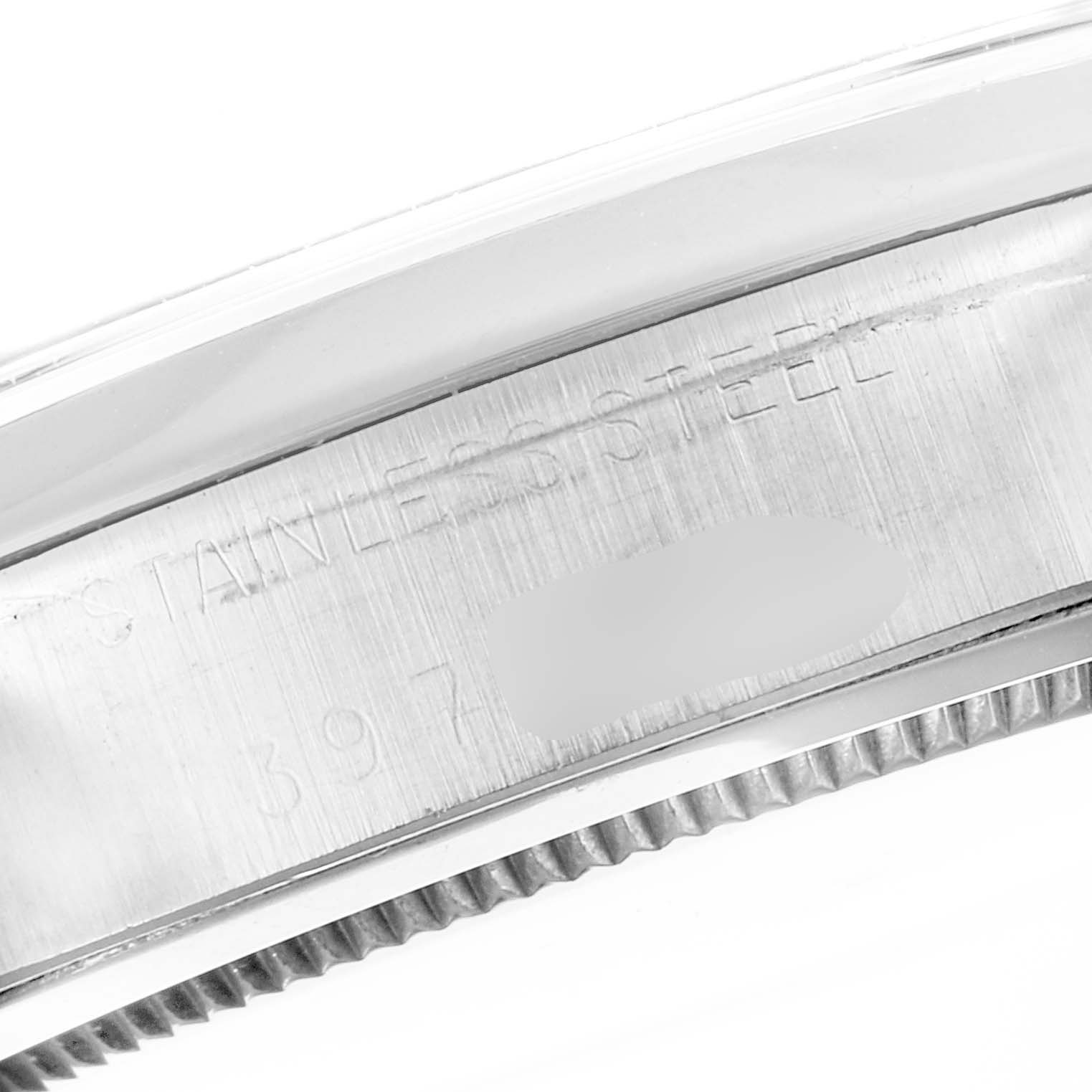 The image shows a close-up view of the stainless steel case of a Rolex Vintage Collection 6694 Men's Stainless Steel Black Dial 6694 Men's Stainless Steel Black Dial model watch.