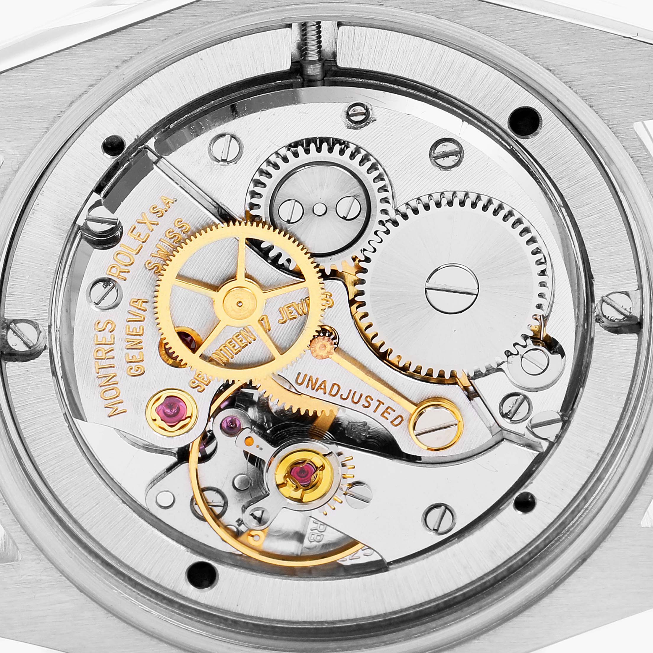 This image shows the intricate internal mechanical parts of a Vintage Collection Rolex watch from a close-up angle.