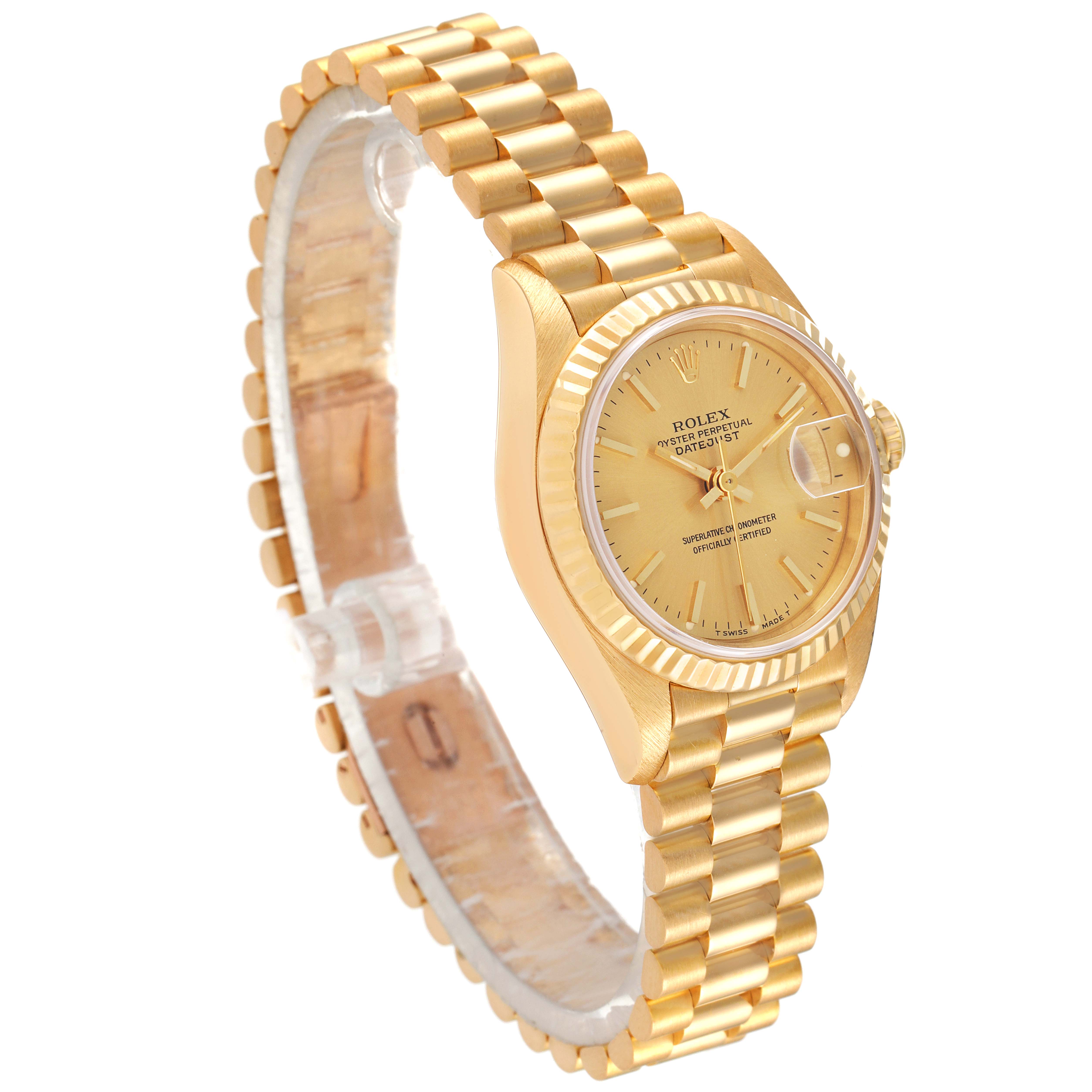 The image shows a President model Rolex watch from an angled side view, highlighting its gold bracelet and dial.