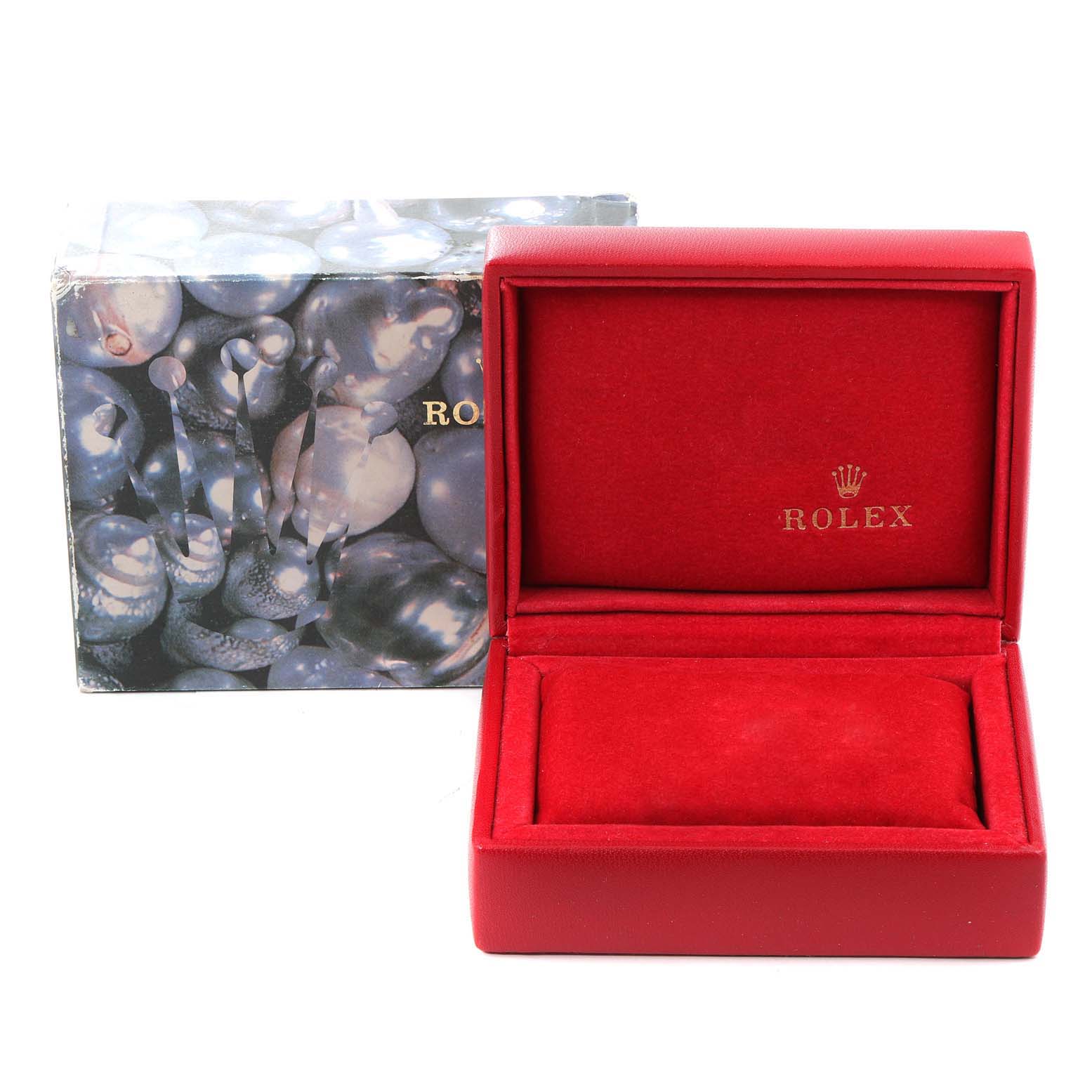 This image shows the opened red watch box and outer packaging for the Rolex President 69178 Women
s Yellow Gold Champagne Dial 69178 Women
s Yellow Gold Champagne Dial model.