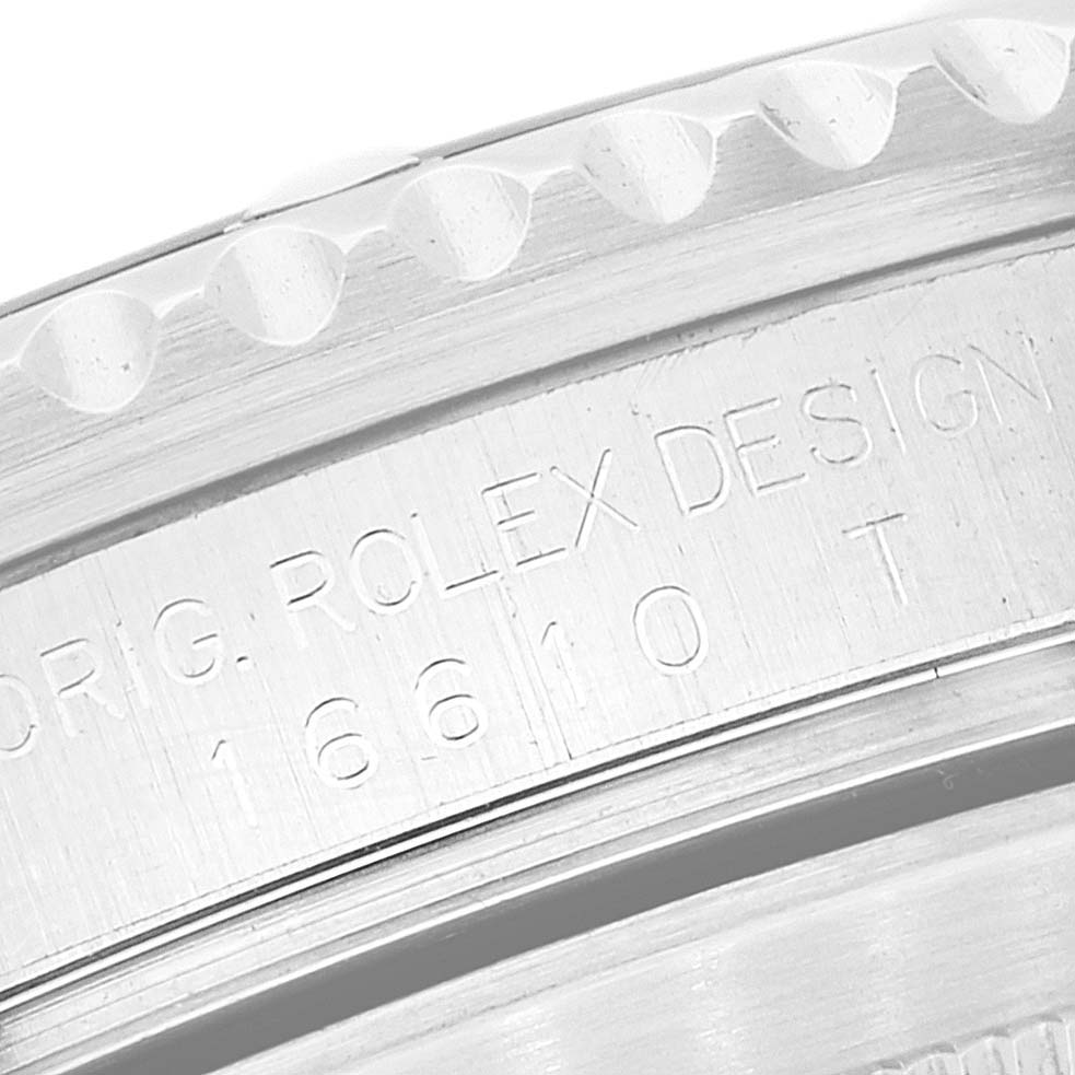 This image shows a close-up of the outer case and engraved text on a Rolex Submariner 16610 Men's Stainless Steel Black Dial 16610 Men's Stainless Steel Black Dial watch.