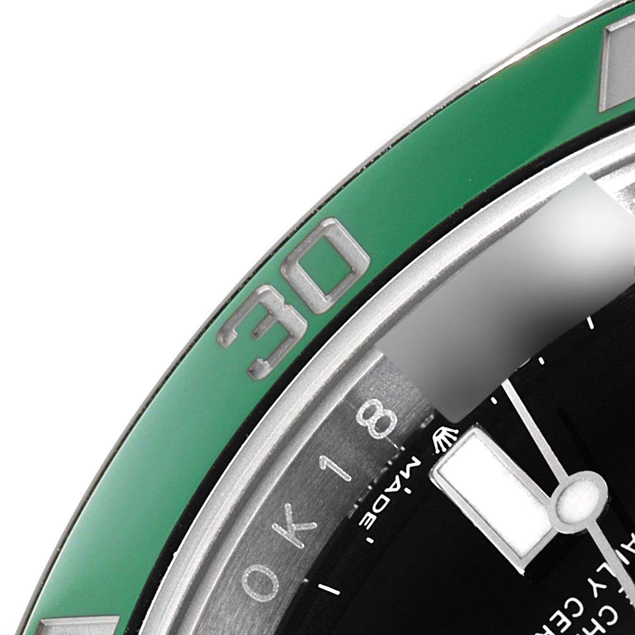 This image shows a close-up of the bezel and part of the dial of a Rolex Submariner 126610LV Men's Stainless Steel Black Dial 126610LV Men's Stainless Steel Black Dial watch.