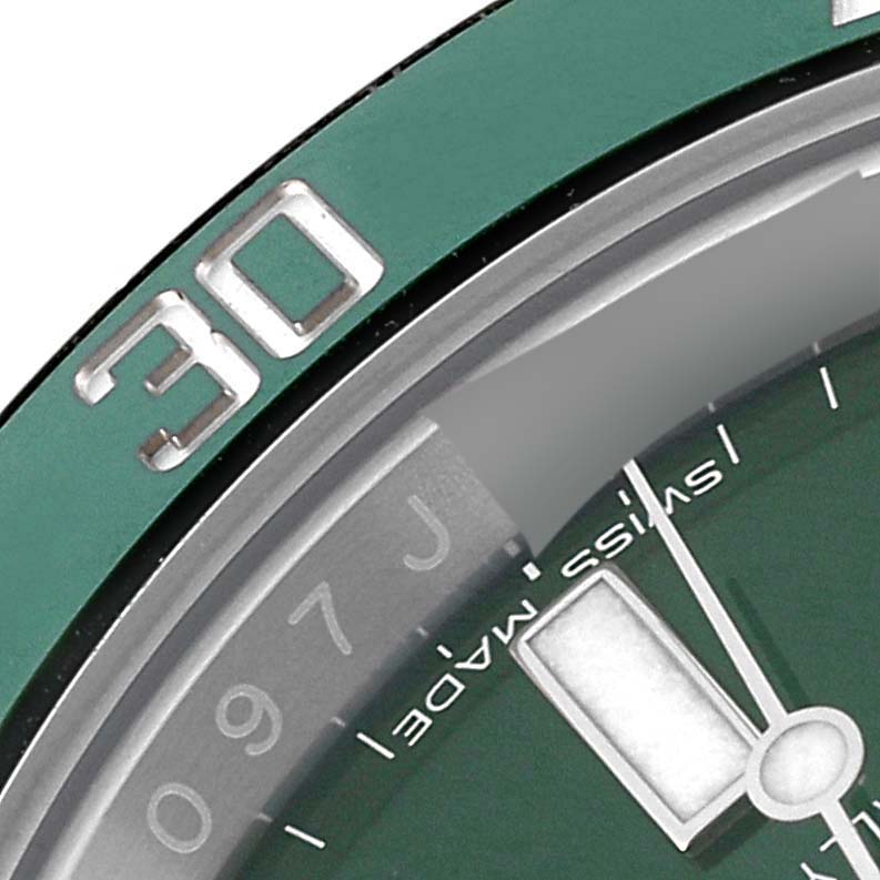 The close-up image shows the bezel, part of the dial, and hour hand of a Rolex Submariner 116610LV Men's Stainless Steel Green Dial 116610LV Men's Stainless Steel Green Dial watch.