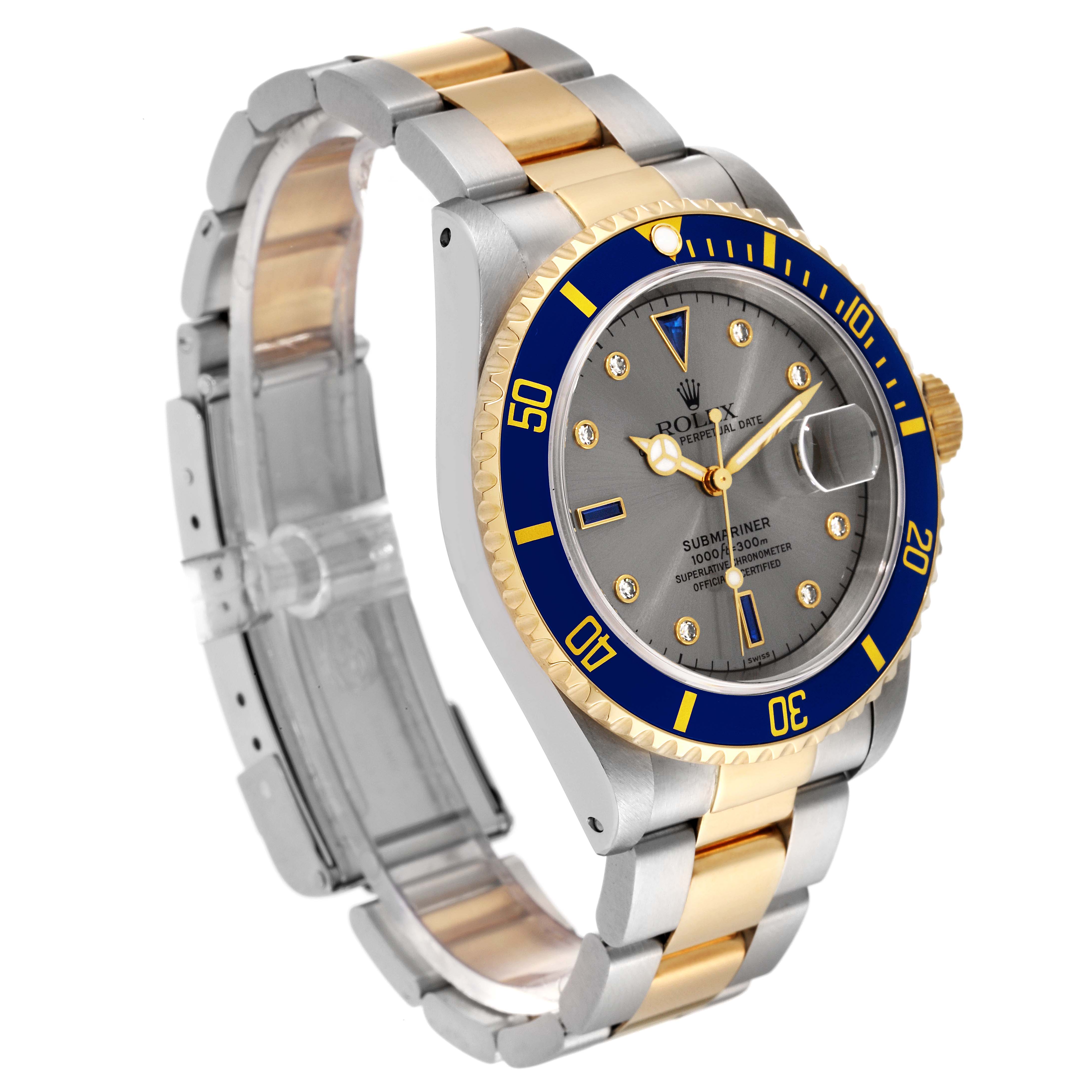 The image shows a Rolex Submariner 16613 Men's Steel and Gold (two tone) Grey Dial 16613 Men's Steel and Gold (two tone) Grey Dial watch at an angled view, highlighting its blue bezel, dial, and two-tone bracelet.