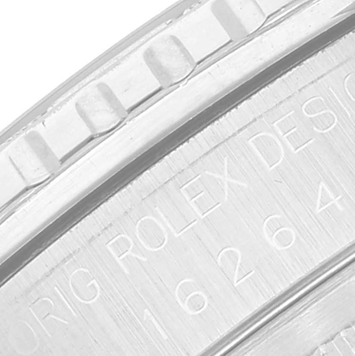 This close-up image of a Rolex Turn-o-Graph 16264 Men
s Stainless Steel Blue Dial 16264 Men
s Stainless Steel Blue Dial watch shows the bezel and part of the inner rim with engraved text.