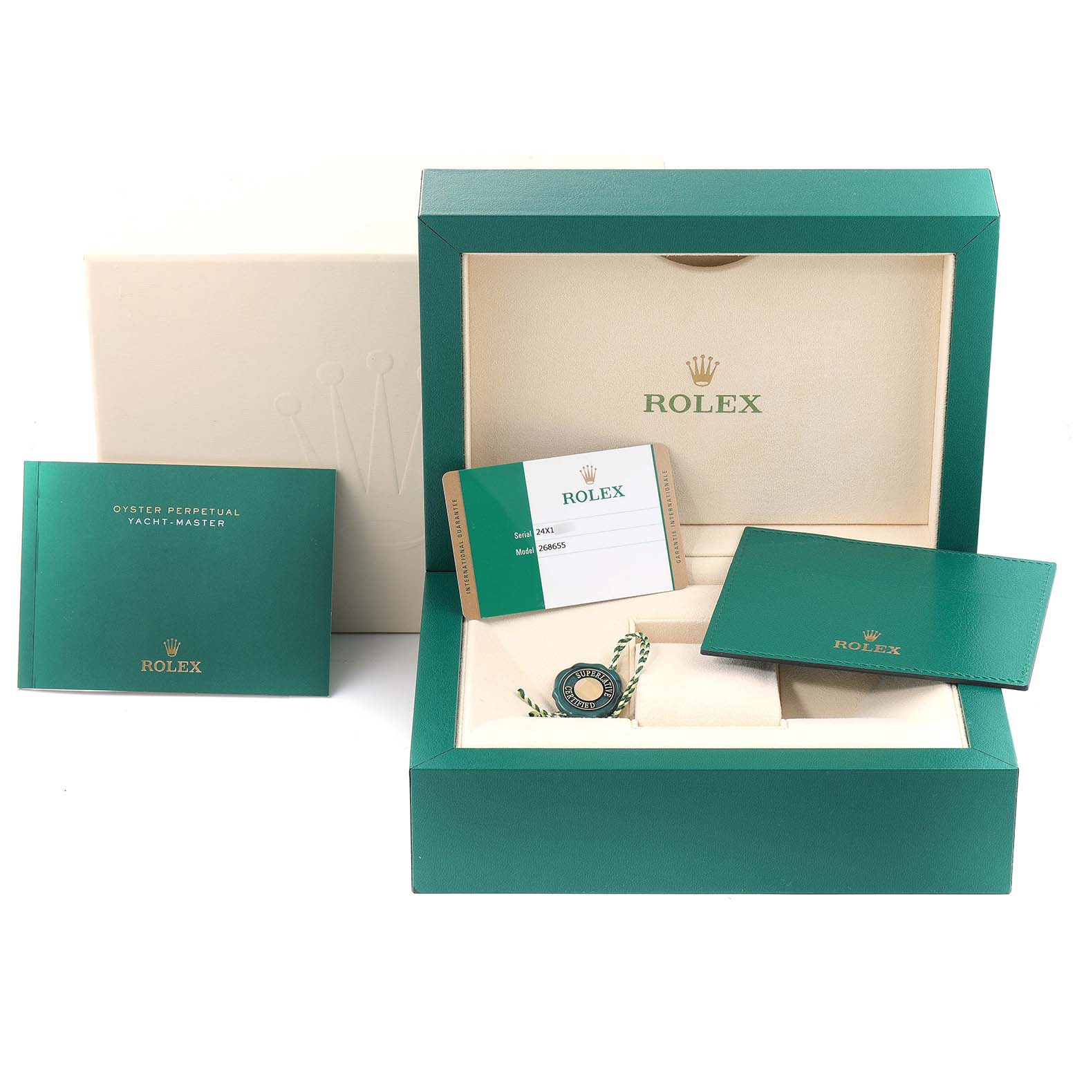 The image shows the packaging, manual, guarantee card, and box of a Rolex Yacht-Master 268655 Men
s Rose Gold Black Dial 268655 Men
s Rose Gold Black Dial watch.