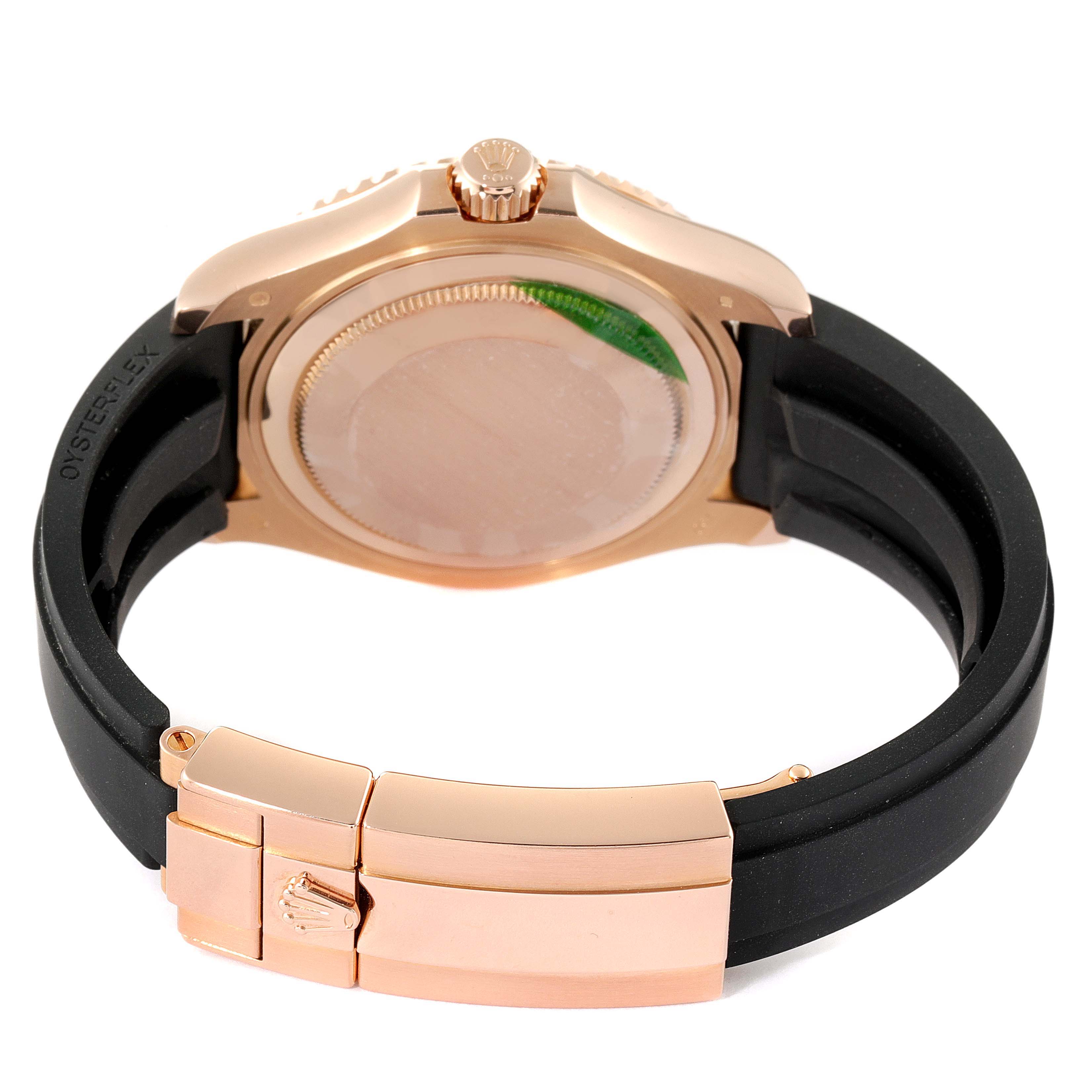 This image shows the back and clasp of the Rolex Yacht-Master 268655 Men
s Rose Gold Black Dial 268655 Men
s Rose Gold Black Dial watch, angled to focus on the case back and the rubber strap.