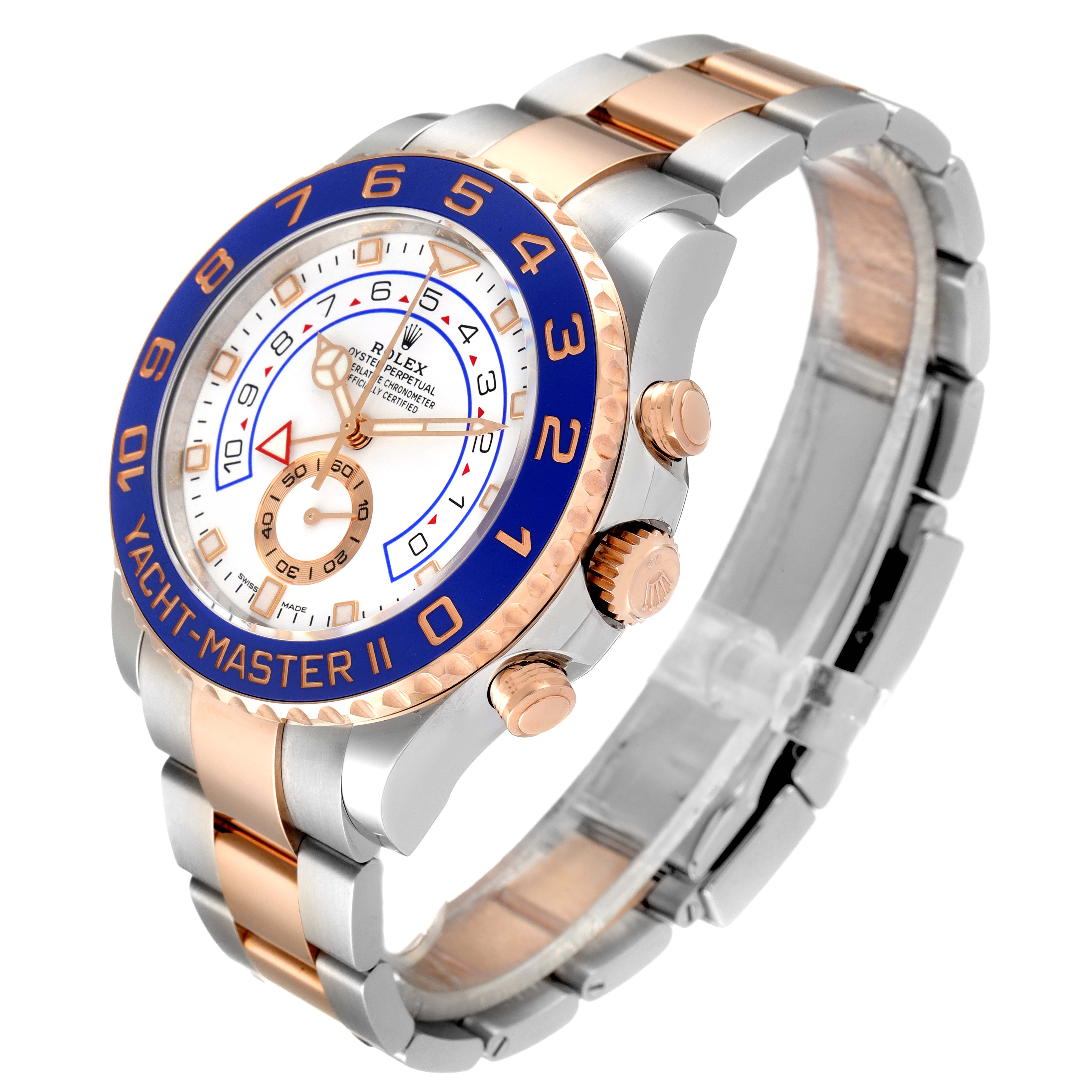 The Rolex Yacht-Master 116681 Men
s Steel and Gold (two tone) White Dial 116681 Men
s Steel and Gold (two tone) White Dial watch is shown at a 3/4 angle, highlighting its bracelet, bezel, crown, and dial.