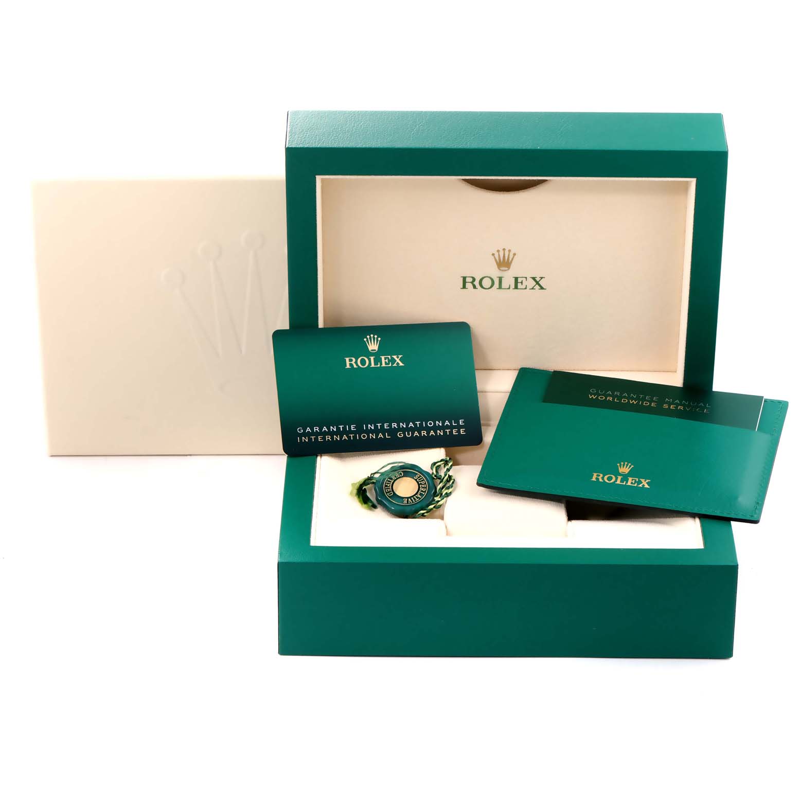 The Rolex Yacht-Master 116681 Men
s Steel and Gold (two tone) White Dial 116681 Men
s Steel and Gold (two tone) White Dial watch box is shown, including international guarantee cards and a tag.