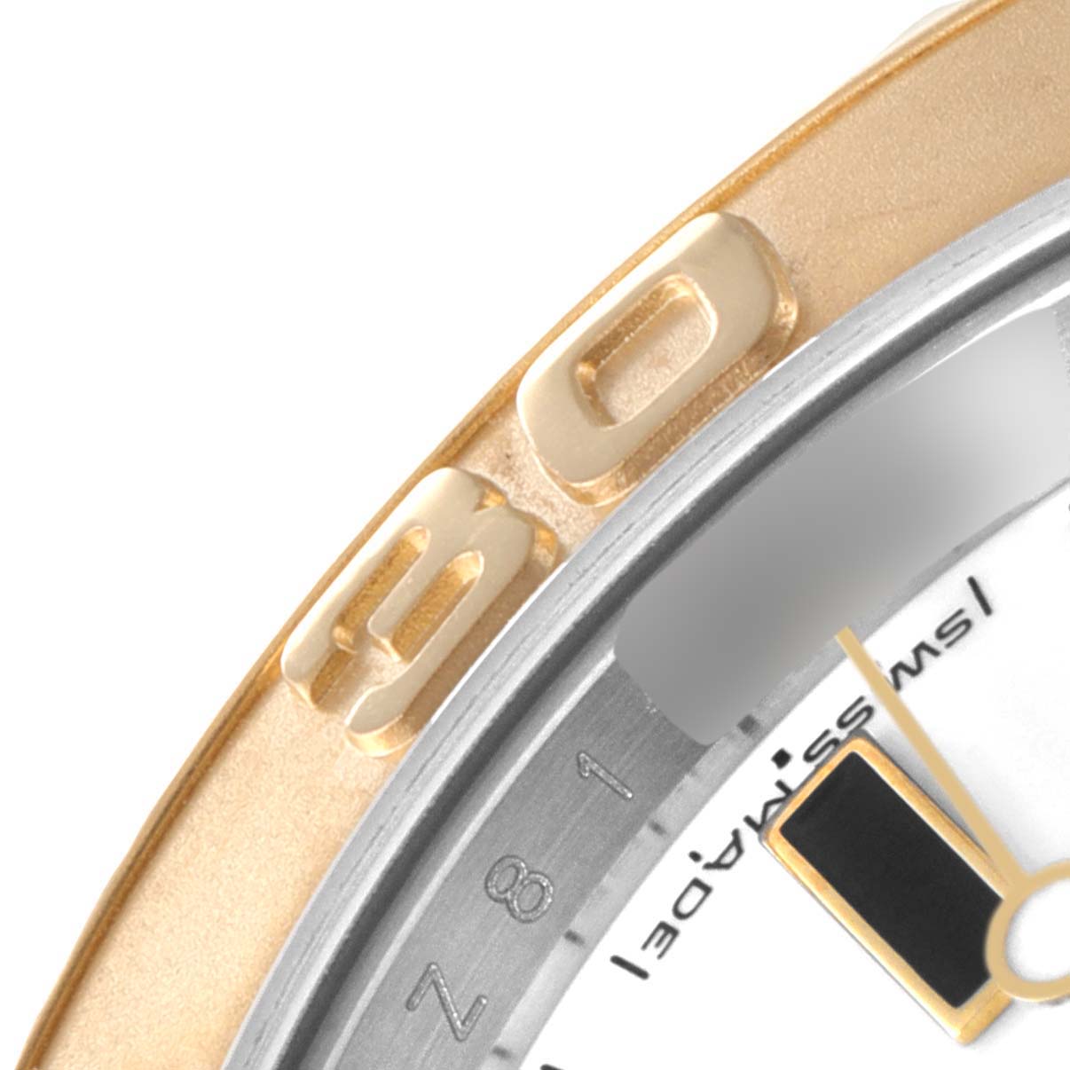 This image shows a close-up of the bezel and part of the dial of a Rolex Yacht-Master 16623 Men
s Steel and Gold (two tone) White Dial 16623 Men
s Steel and Gold (two tone) White Dial watch.