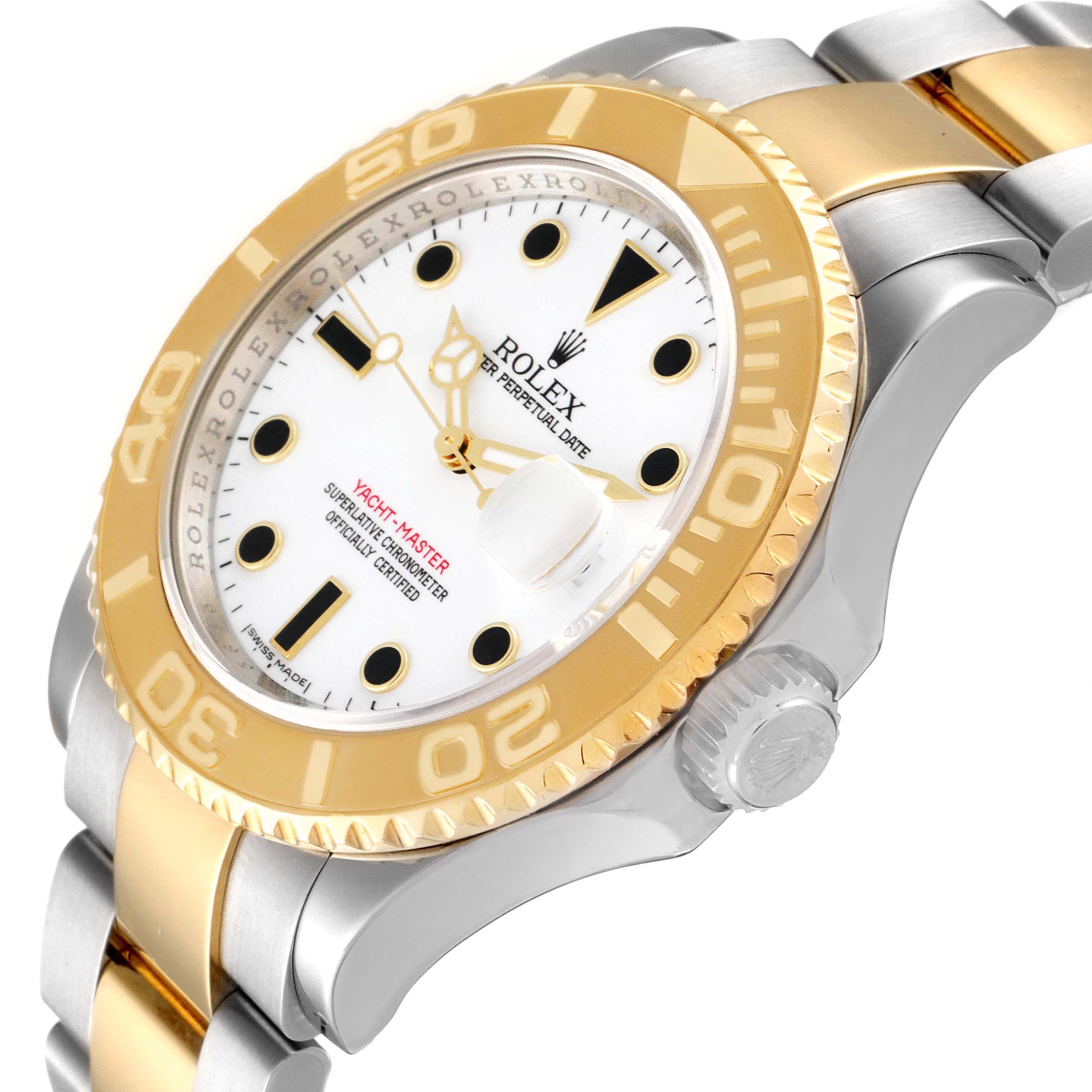 This image shows a close-up, angled view of the dial, bezel, and part of the bracelet of a Rolex Yacht-Master 16623 Men
s Steel and Gold (two tone) White Dial 16623 Men
s Steel and Gold (two tone) White Dial watch.
