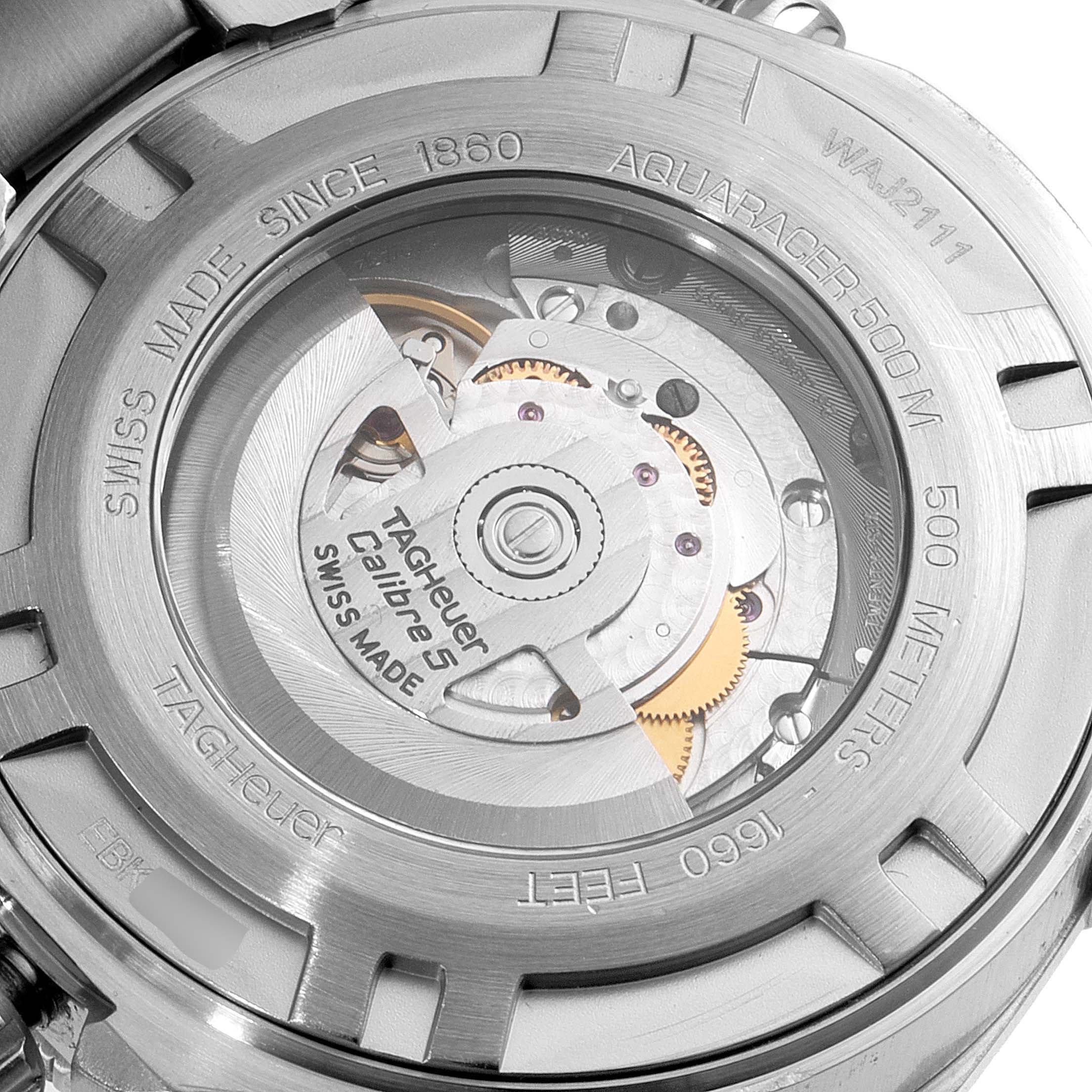 This image shows the back casing of the Tag Heuer Aquaracer WAJ2111.BA0870 Men's Stainless Steel Grey Dial WAJ2111.BA0870 Men's Stainless Steel Grey Dial watch, highlighting its internal mechanical movements.