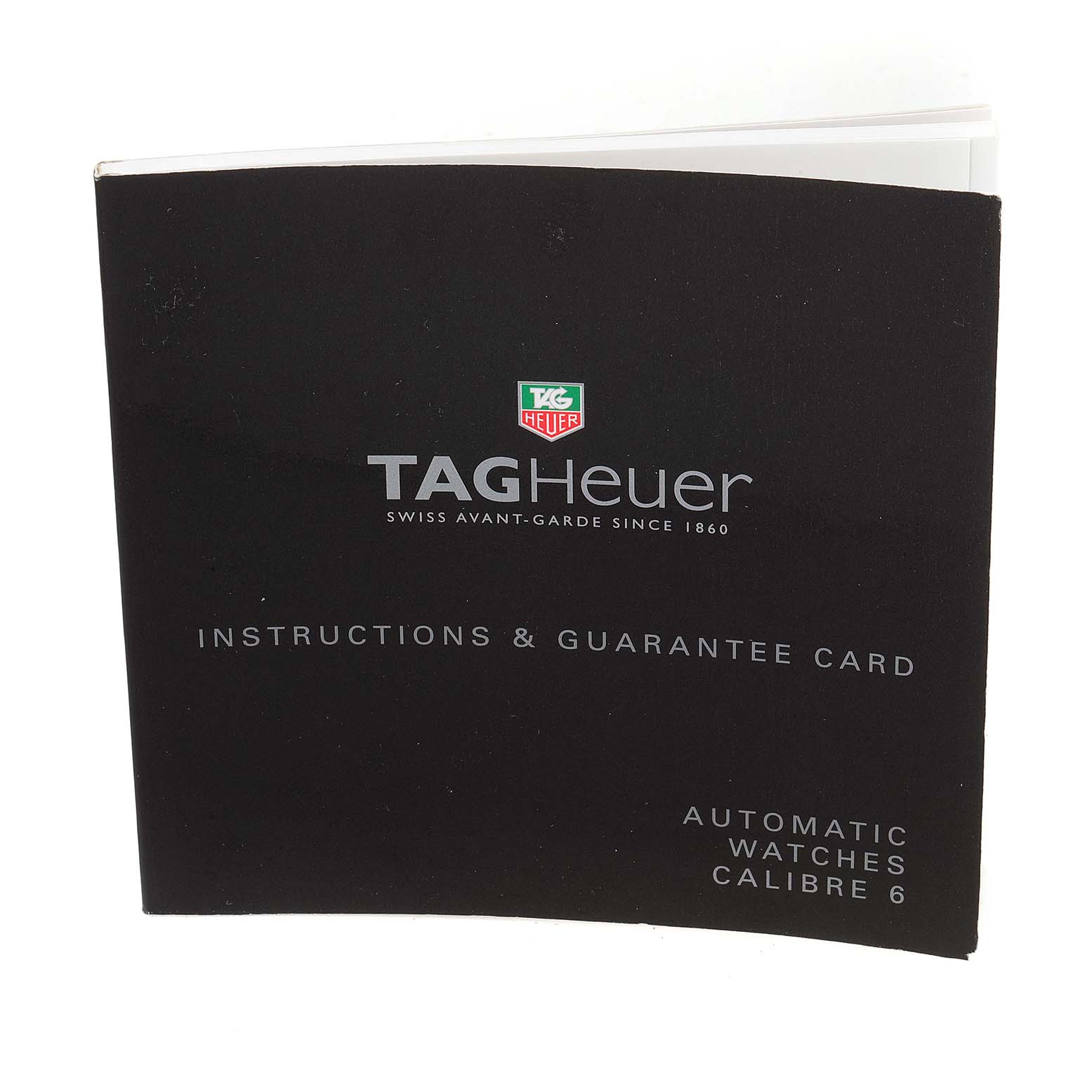 This image shows the instruction manual and guarantee card for the Tag Heuer Aquaracer WAJ2111.BA0870 Men's Stainless Steel Grey Dial WAJ2111.BA0870 Men's Stainless Steel Grey Dial model.