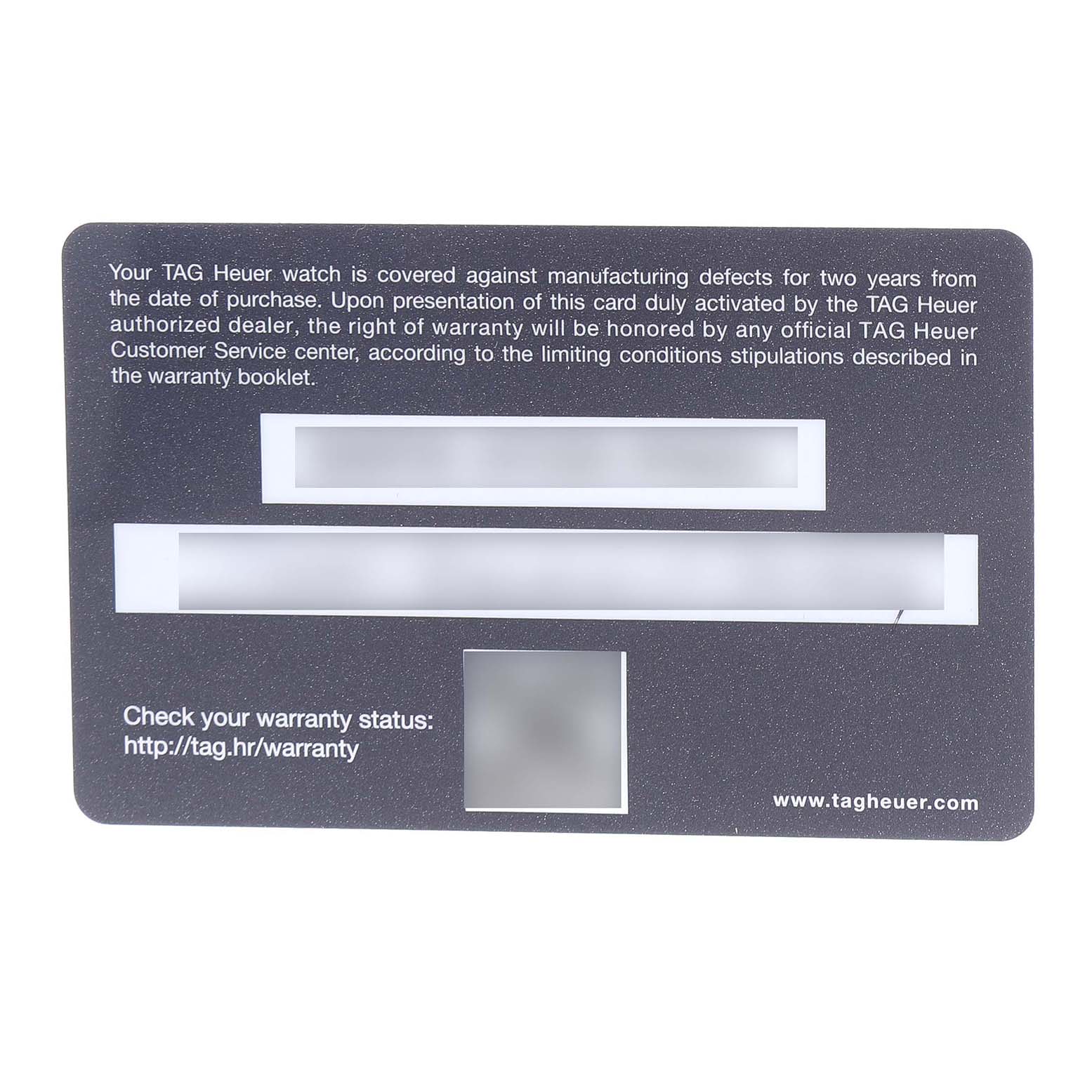 The image shows a TAG Heuer Carrera warranty card laid flat, displaying text and a website URL.