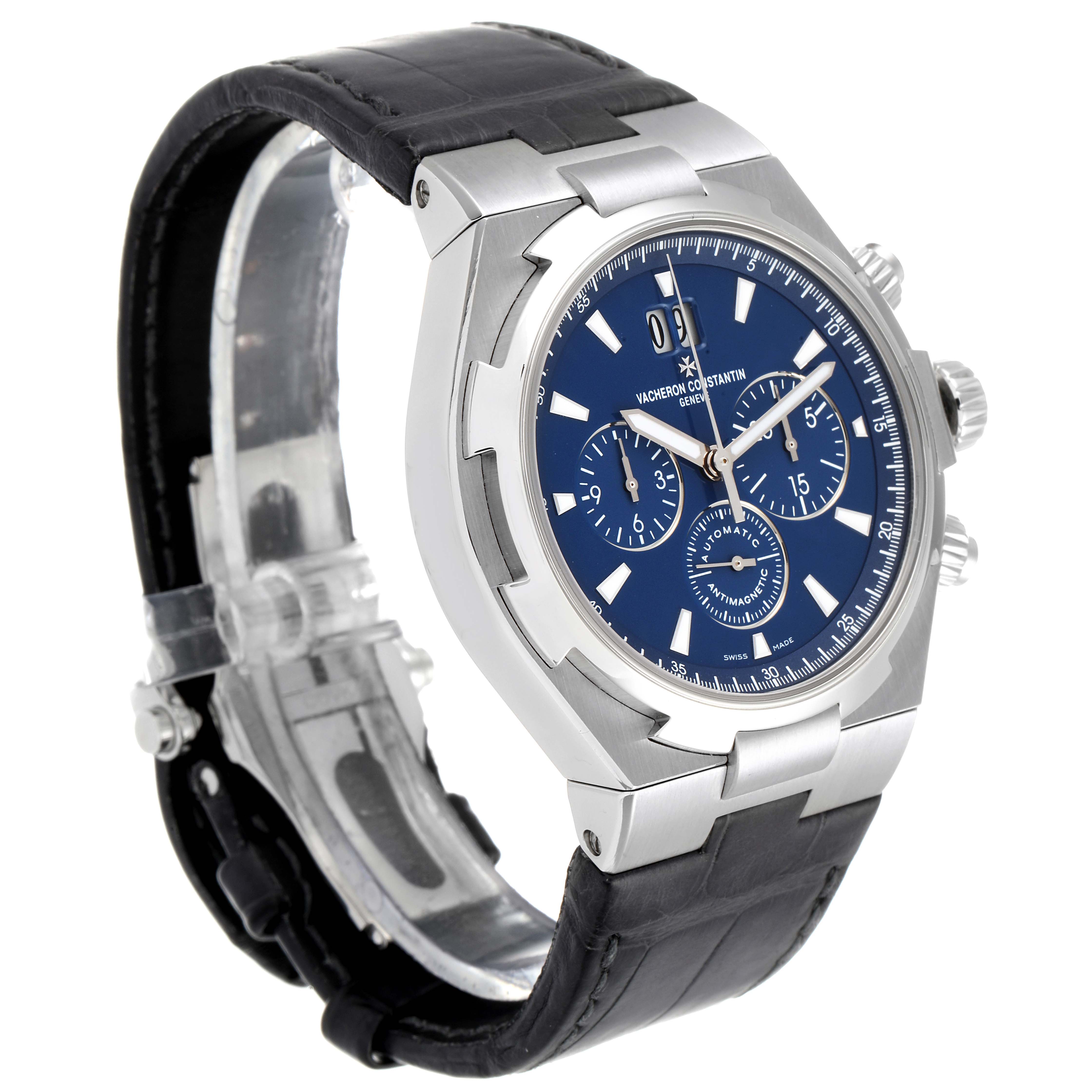 The Vacheron Constantin Overseas 49150.B01A.9097 Men's Stainless Steel Blue Dial 49150.B01A.9097 Men's Stainless Steel Blue Dial watch is shown at an angle highlighting the dial, crown, pushers, and leather strap.