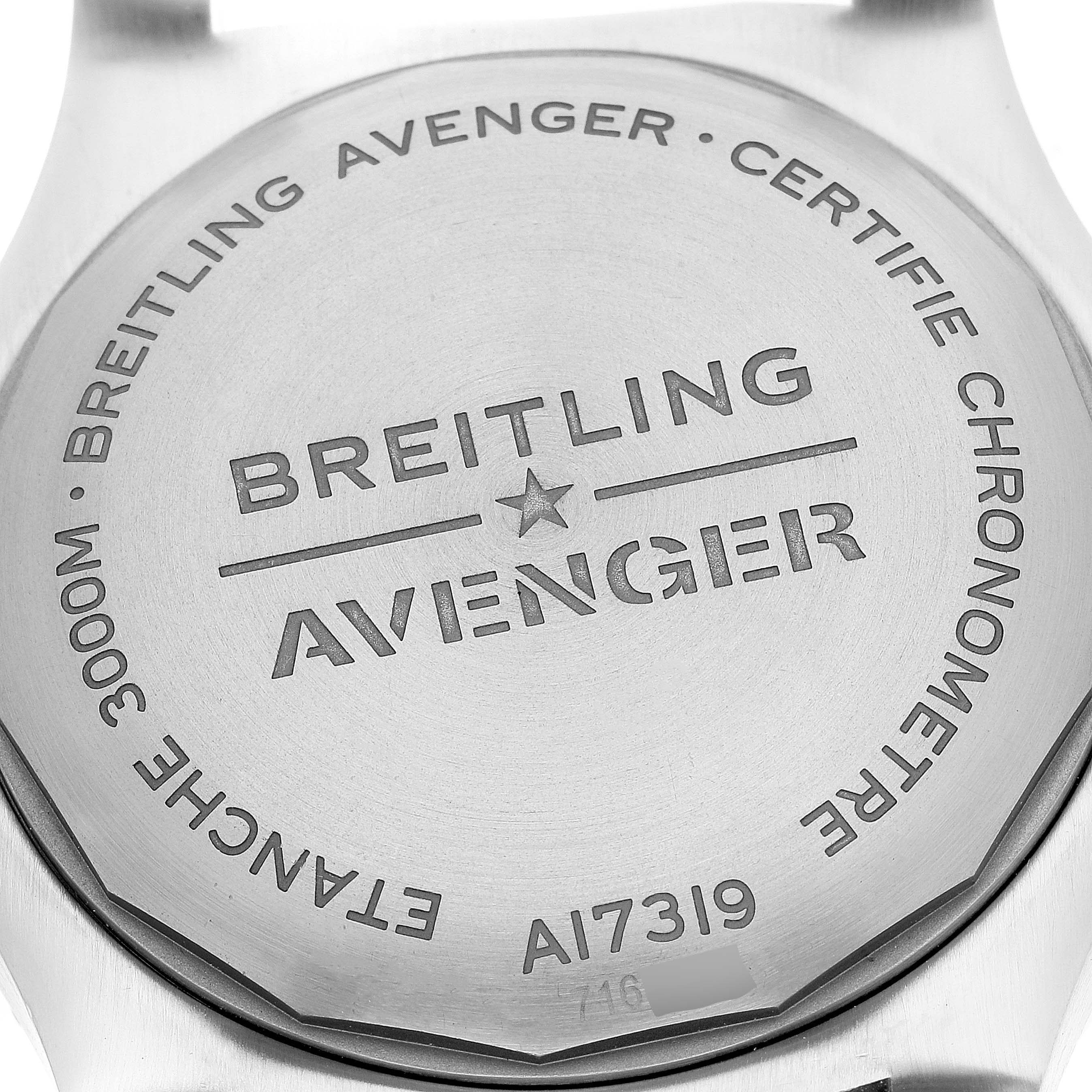 The image shows the back case of a Breitling Avenger A17319 Men's Stainless Steel Yellow Dial A17319 Men's Stainless Steel Yellow Dial watch, detailing model information and water resistance.