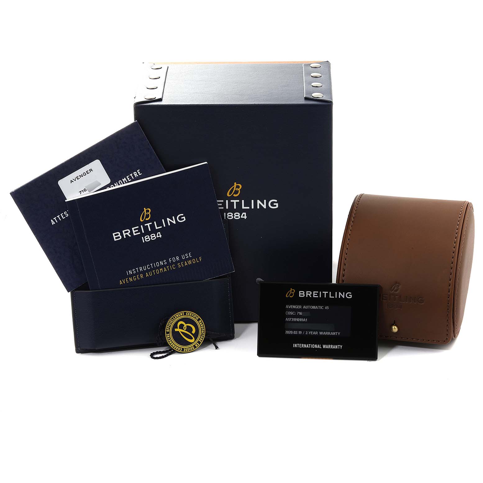 The image shows packaging and accessories for the Breitling Avenger A17319 Men's Stainless Steel Yellow Dial A17319 Men's Stainless Steel Yellow Dial watch, including manuals, a certificate, a warranty card, a box, and a case.