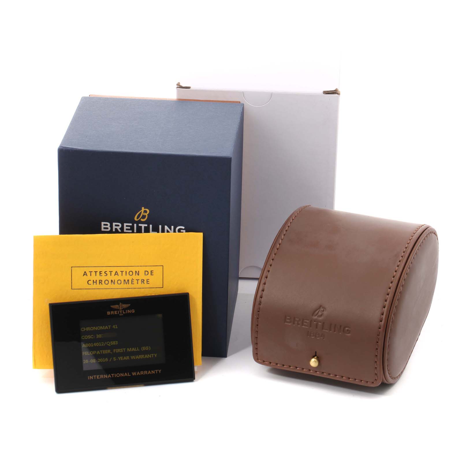 The image shows the packaging and accessories for a Breitling Chronomat AB0140 Men's Stainless Steel Brown Dial AB0140 Men's Stainless Steel Brown Dial watch, including a box, brown leather case, warranty card, and certificate.
