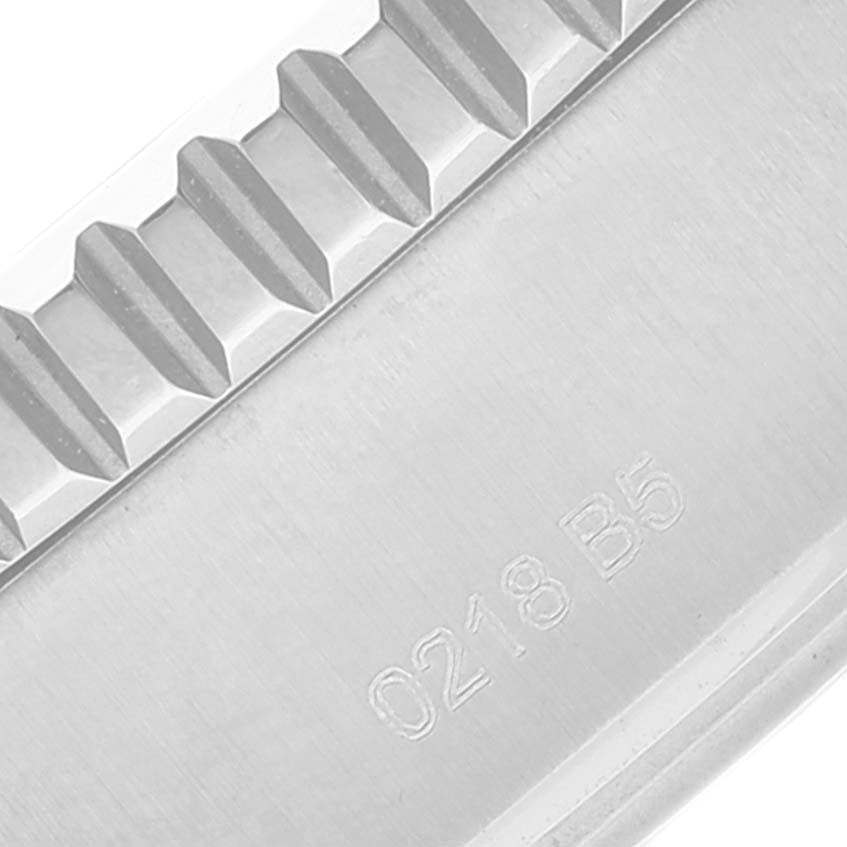 This is a close-up view of the ridged edge and engraved serial number on the side of a Breitling Superocean A17392D8/C910 Men's Stainless Steel Blue Dial A17392D8/C910 Men's Stainless Steel Blue Dial watch.