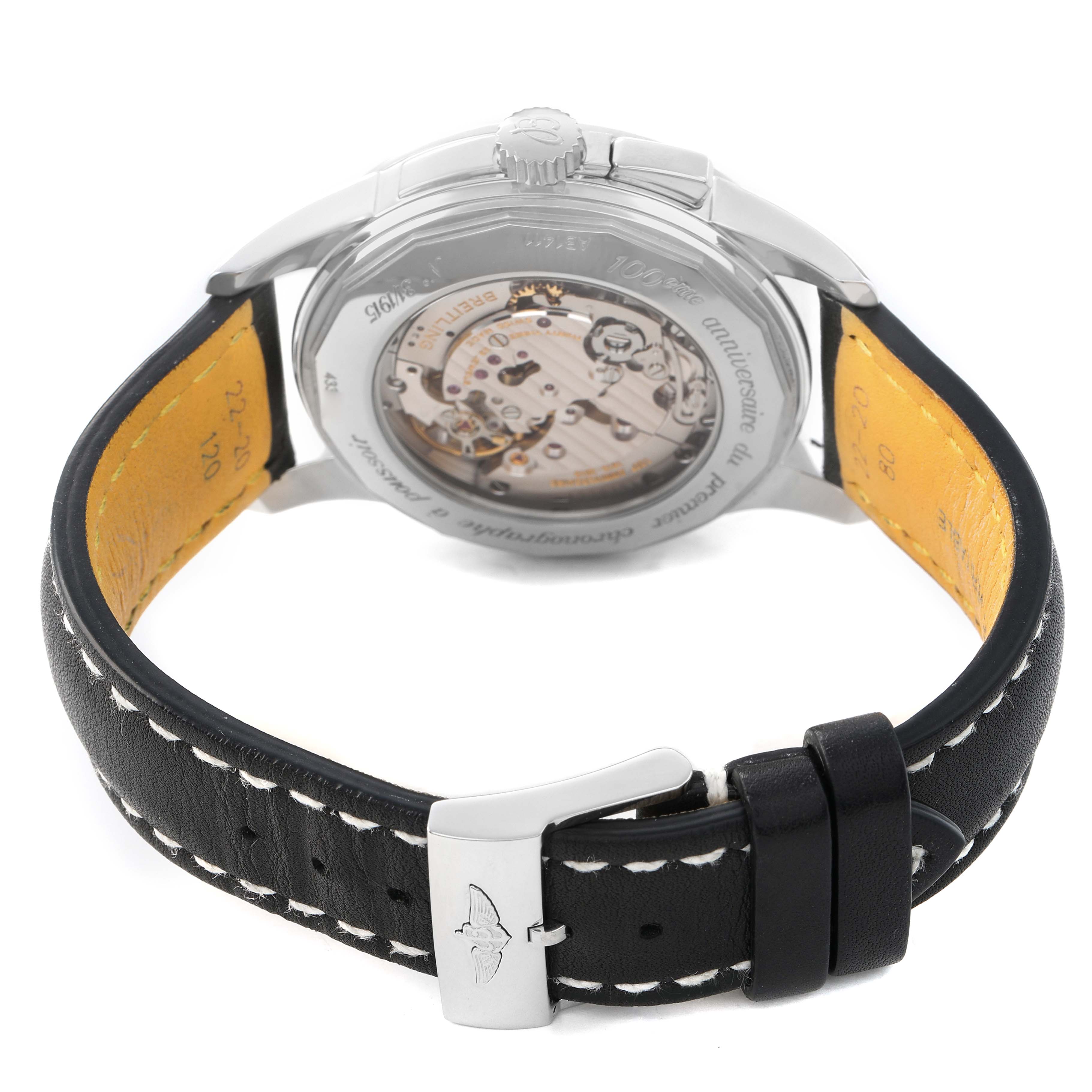 The Breitling Transocean AB1411 Men's Stainless Steel Silver Dial watch is shown from the back, displaying its transparent case back and black leather strap with white stitching.