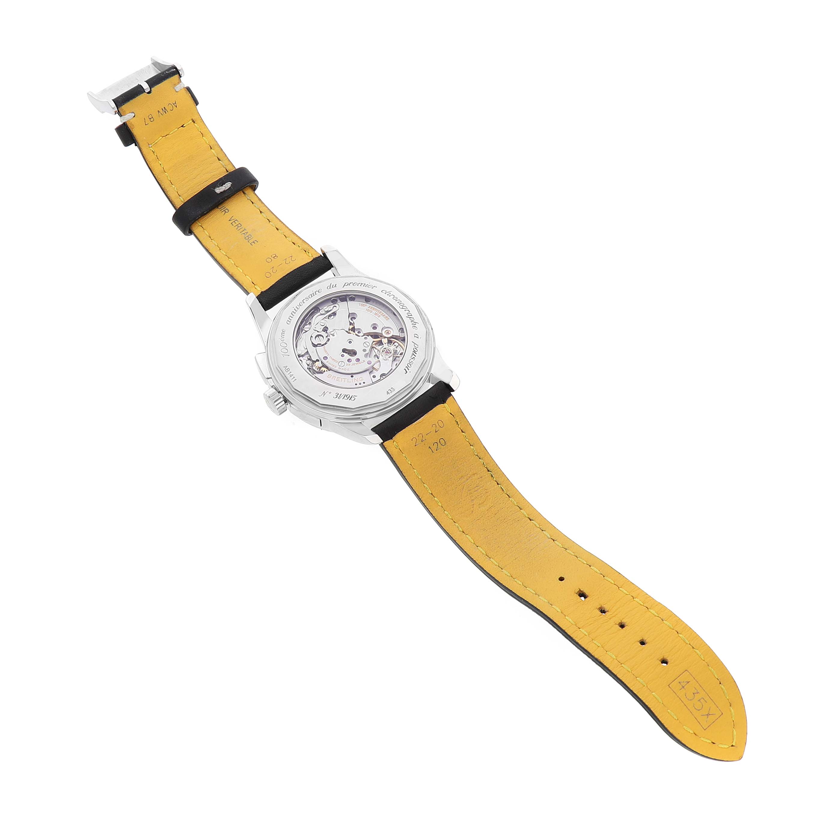 The Breitling Transocean AB1411 Men's Stainless Steel Silver Dial watch is shown from the back, displaying its open case back and yellow strap lining.