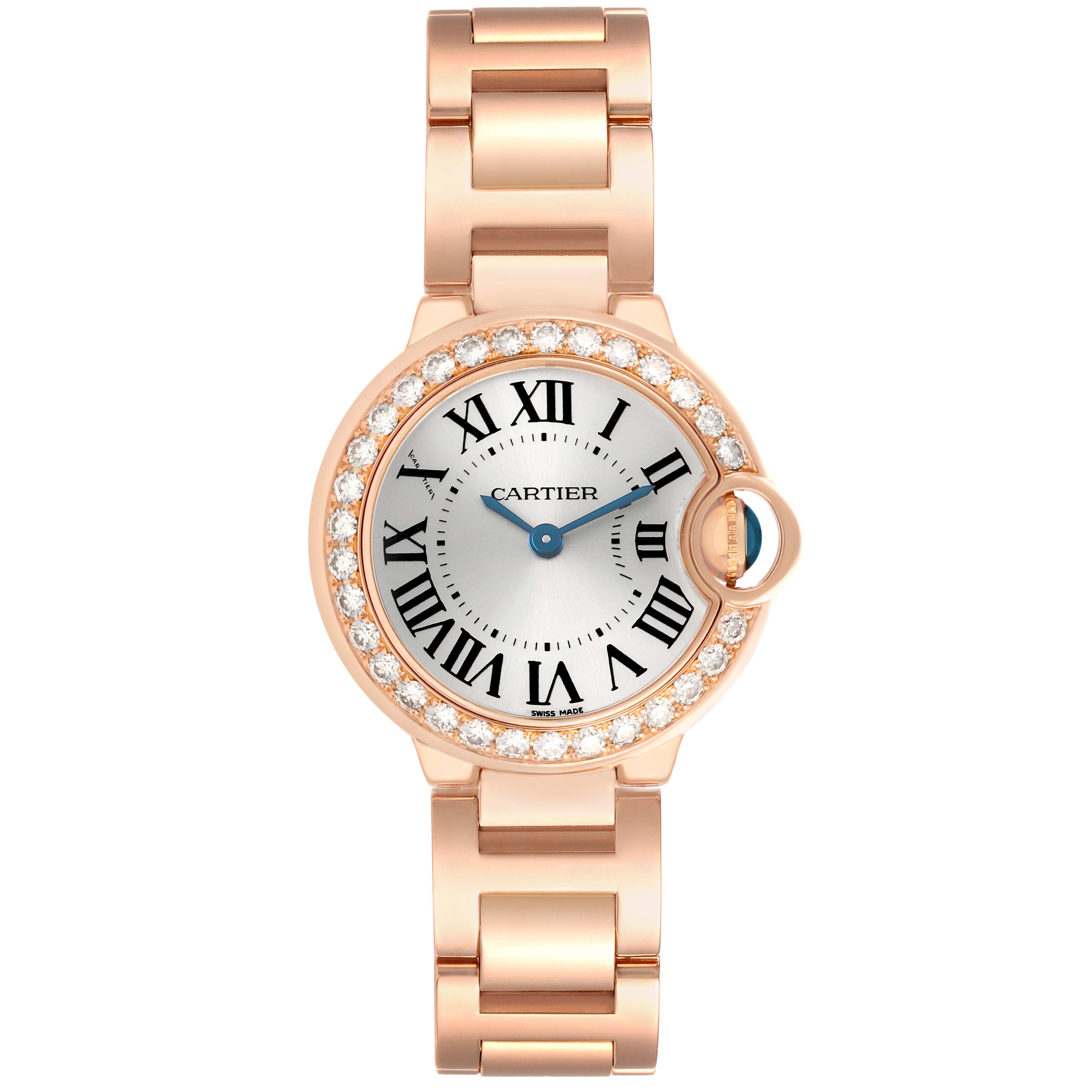 The Cartier Ballon Bleu WE9002Z3 Women's Rose Gold Silver Dial watch is shown from a top view, highlighting its round face, Roman numerals, and metal bracelet.