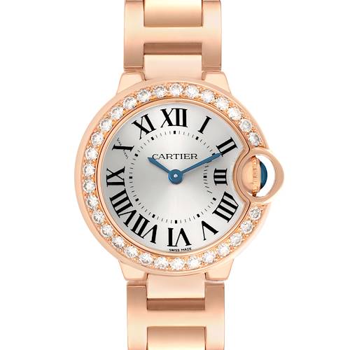 The Cartier Ballon Bleu WE9002Z3 Women's Rose Gold Silver Dial watch is shown from a front angle, highlighting the diamond-encrusted bezel, roman numerals, and steel bracelet.