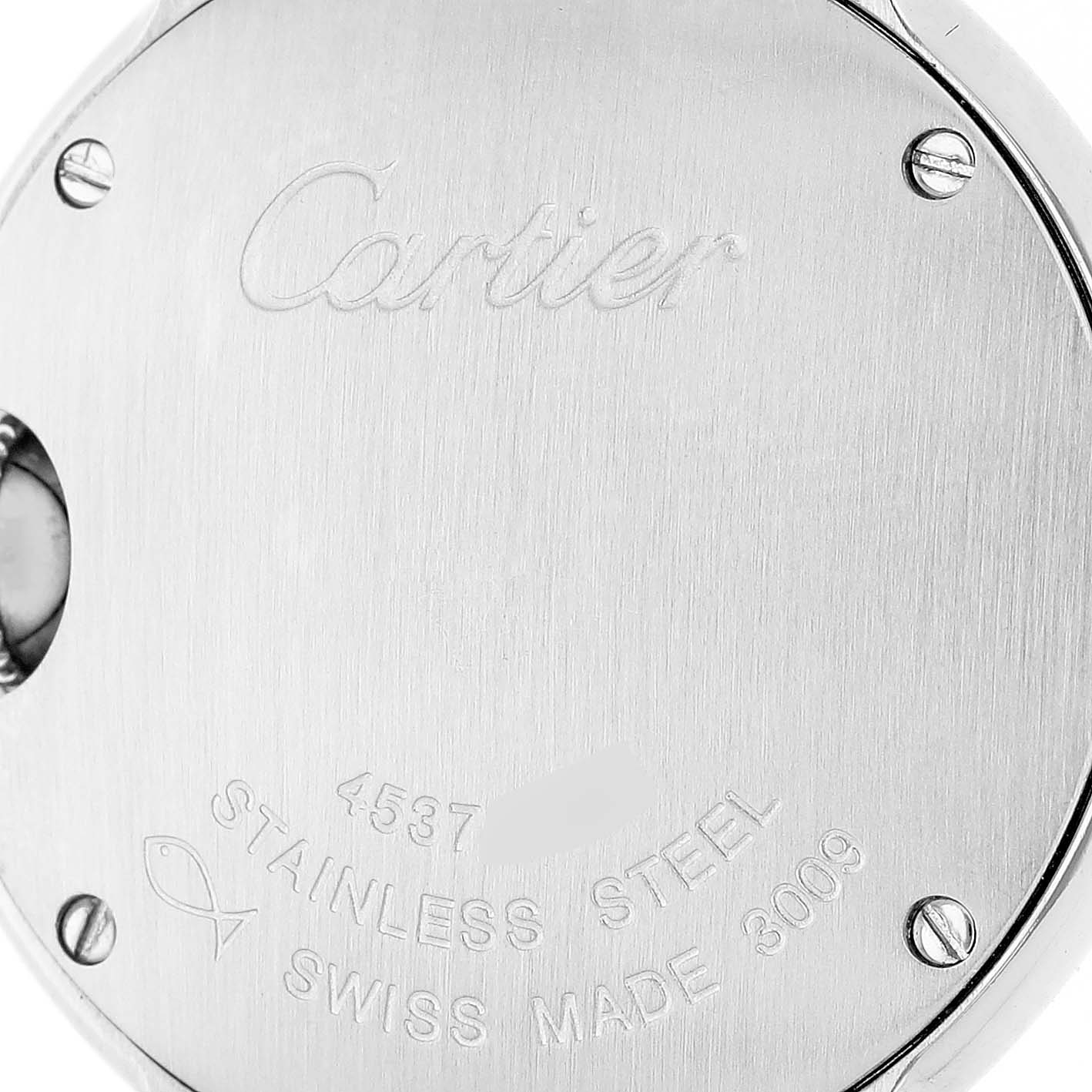 The image shows the back of a Cartier Ballon Bleu W69010Z4 Women's Stainless Steel Silver Dial watch, highlighting the engraved logo and text on the stainless steel case.