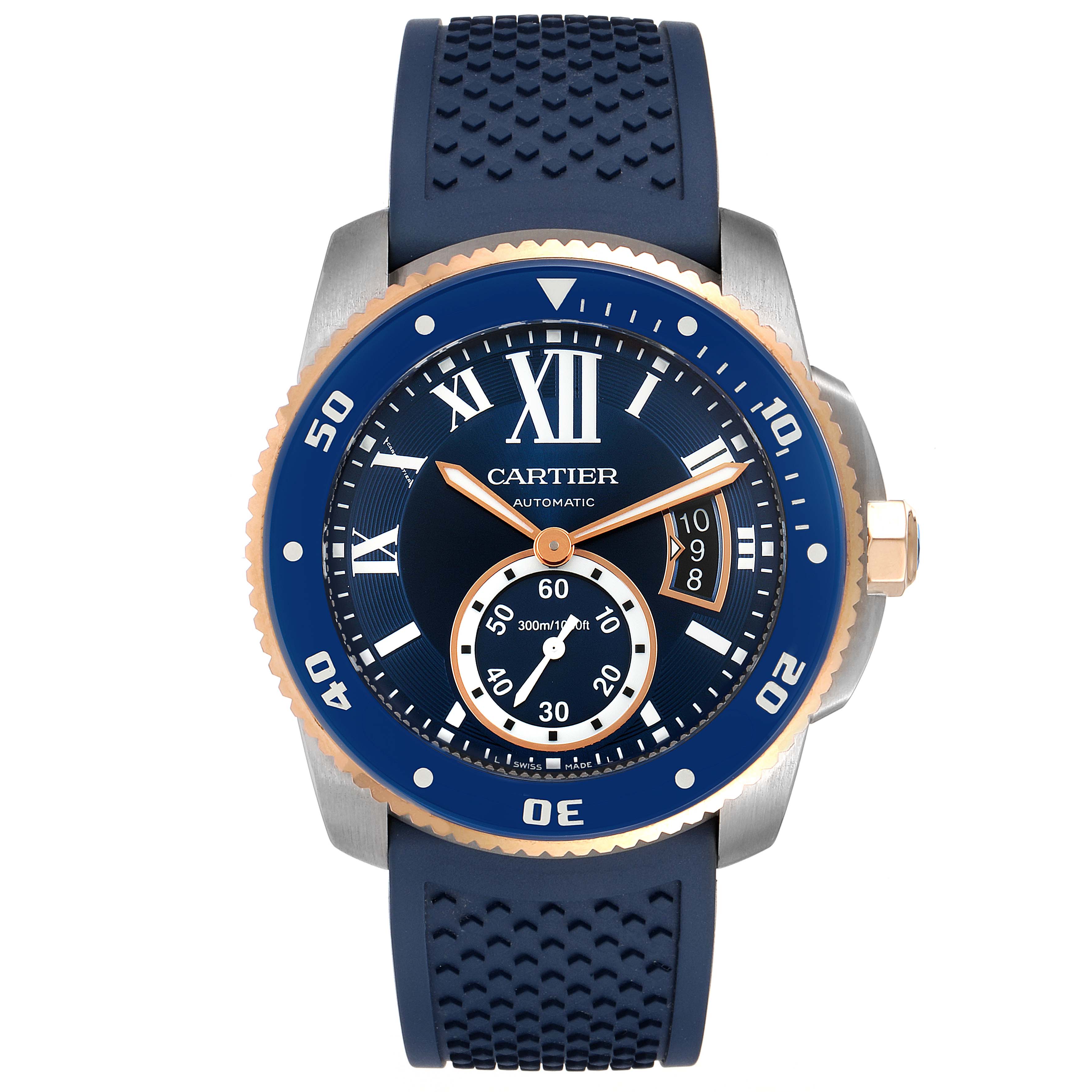 The image shows a front view of the Calibre de Cartier watch by Cartier, featuring a blue dial and rubber strap.