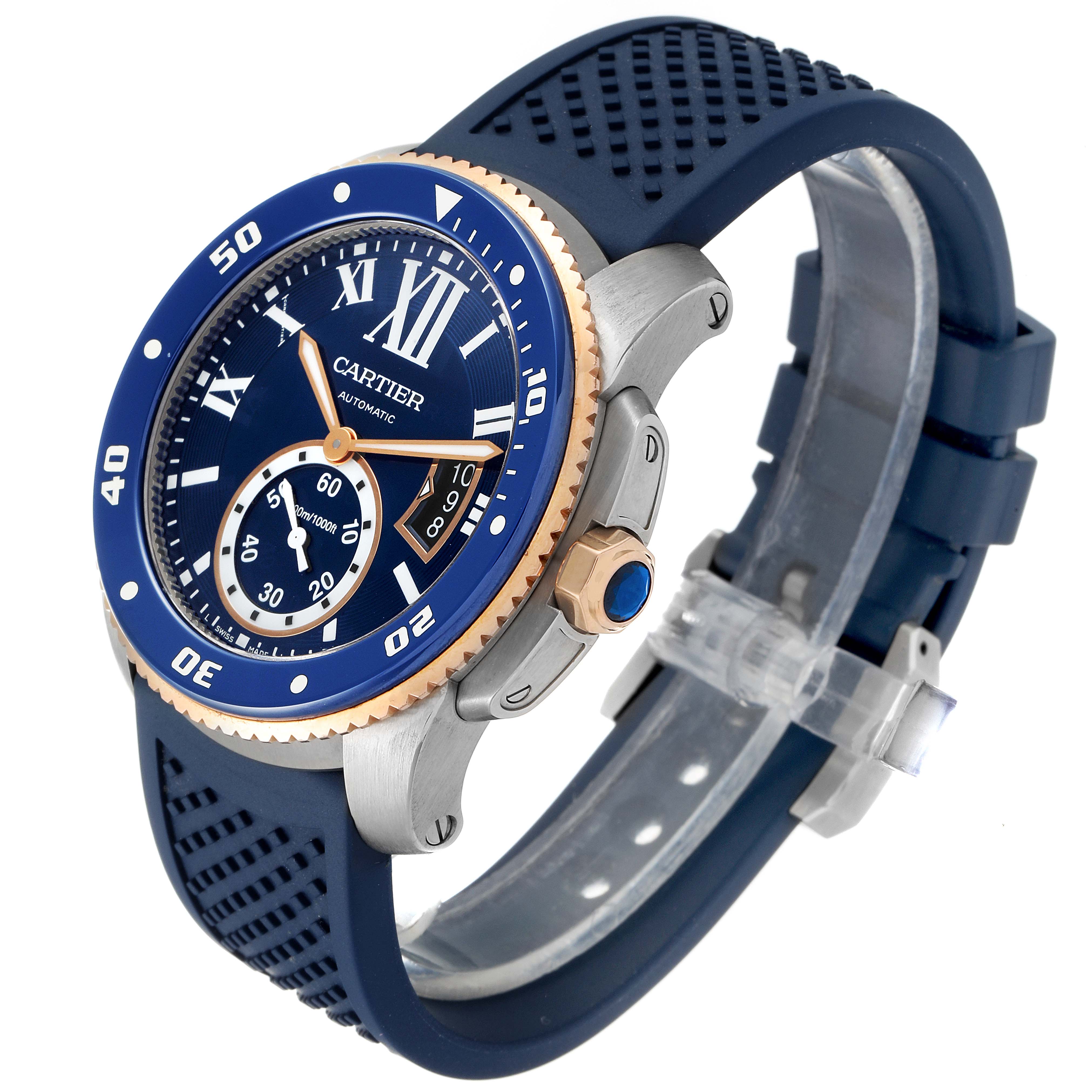 The image shows a Calibre de Cartier watch by Cartier at an angled view, highlighting its dial, bezel, crown, and strap.