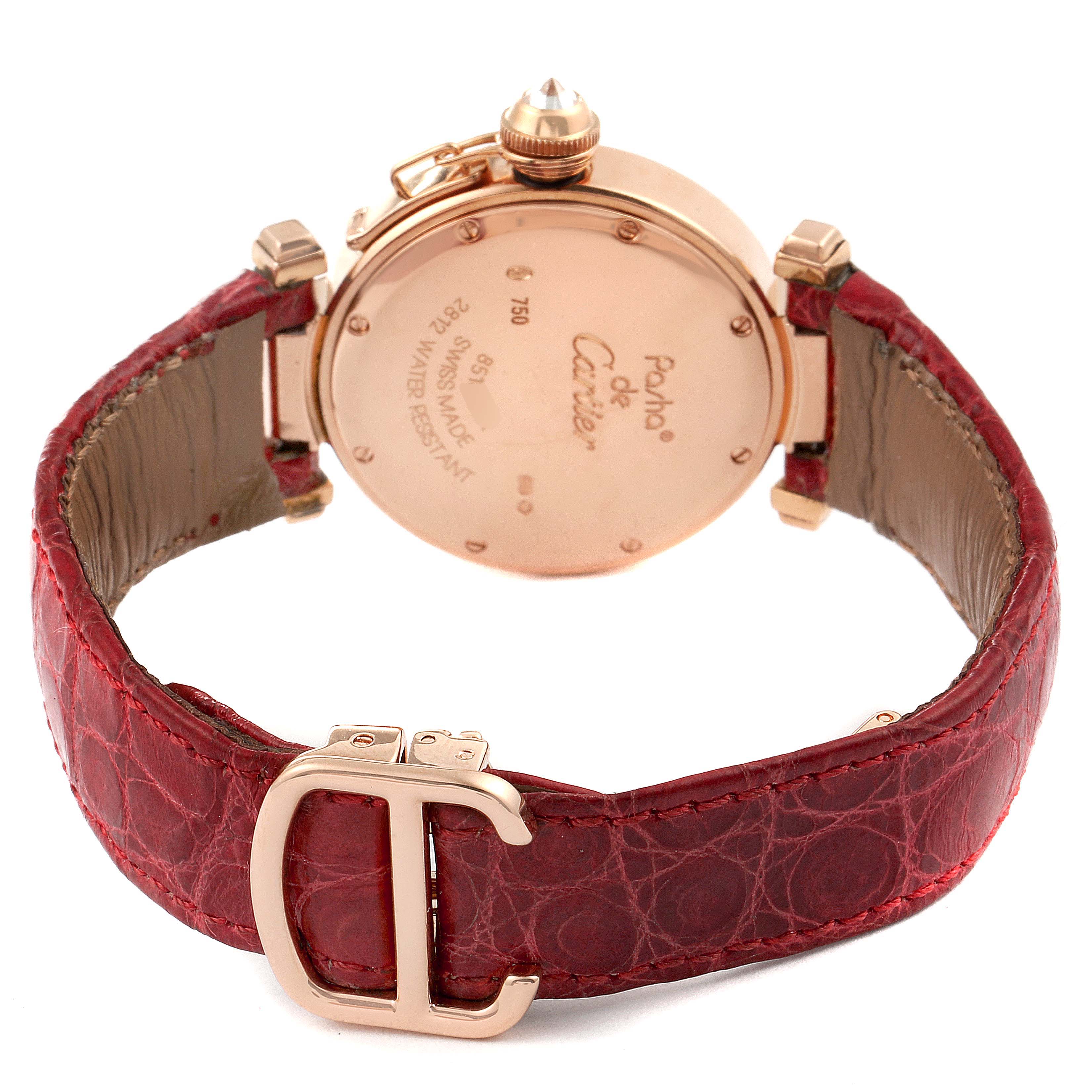 The image shows the back and side of the Cartier Pasha WJ123021 Women's Rose Gold Silver Dial WJ123021 Women's Rose Gold Silver Dial watch with its red leather strap and buckle.