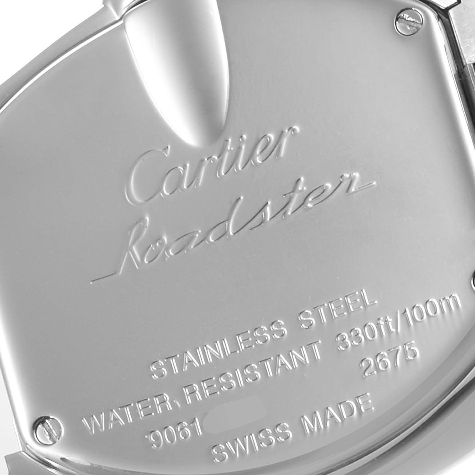 The image shows a close-up of the back case of a Cartier Roadster W62054V3 Women
s Stainless Steel Pink Dial W62054V3 Women
s Stainless Steel Pink Dial watch, highlighting the engravings.