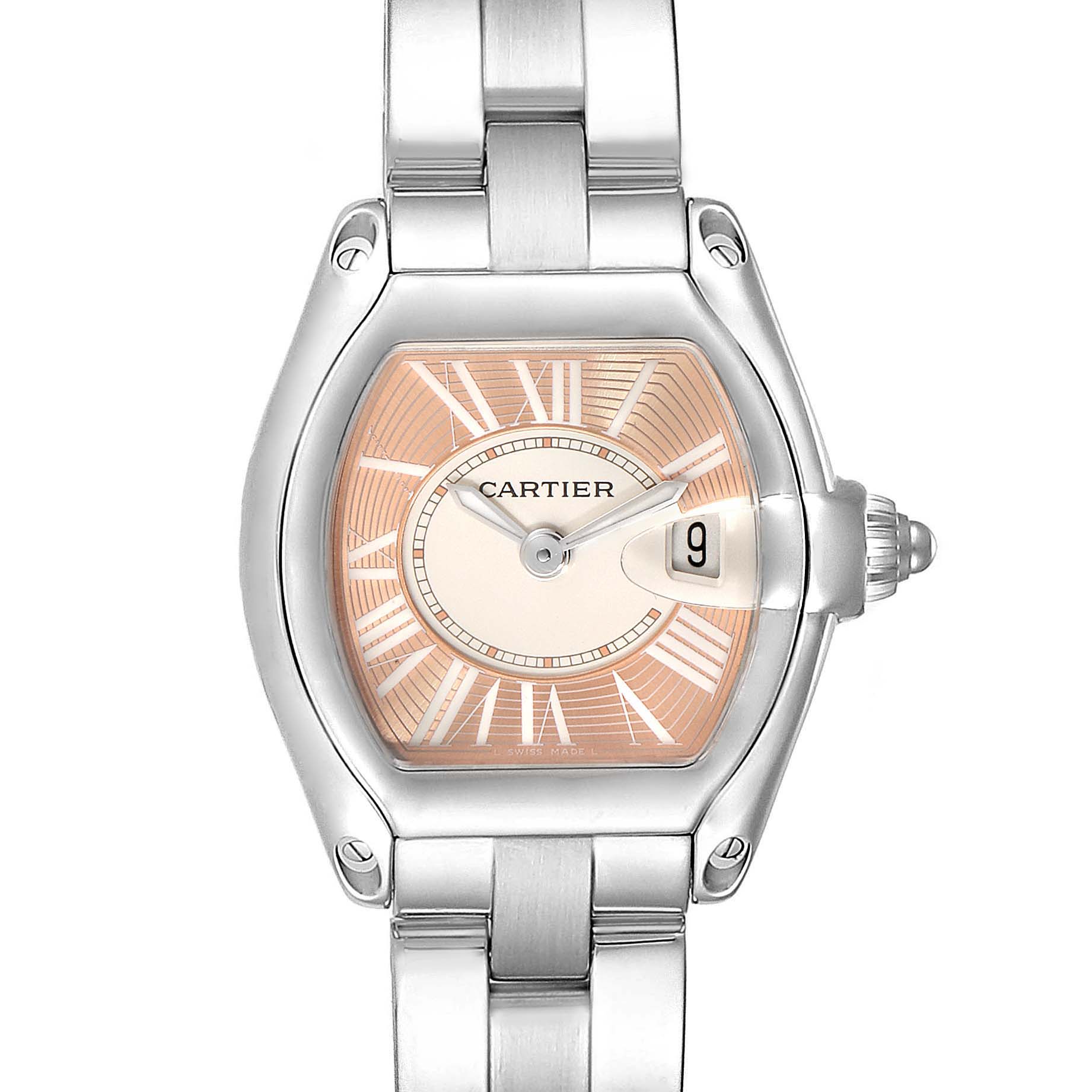 The image shows a front view of the Cartier Roadster W62054V3 Women
s Stainless Steel Pink Dial W62054V3 Women
s Stainless Steel Pink Dial watch, displaying its face, bezel, and part of its bracelet.
