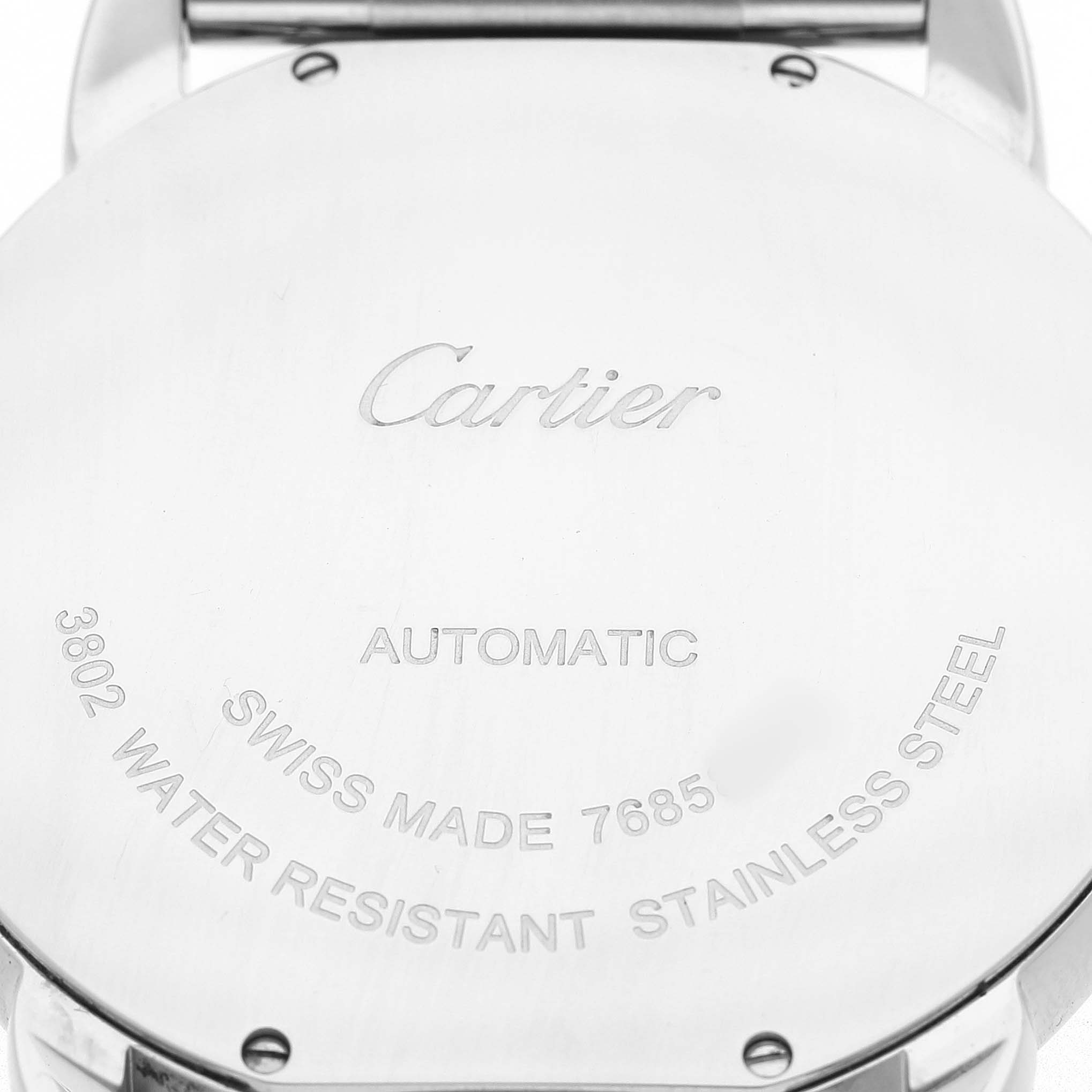 The image shows the back case of a Cartier Ronde W6701011 Men's Stainless Steel Silver Dial watch, highlighting its engravings and stainless steel material.