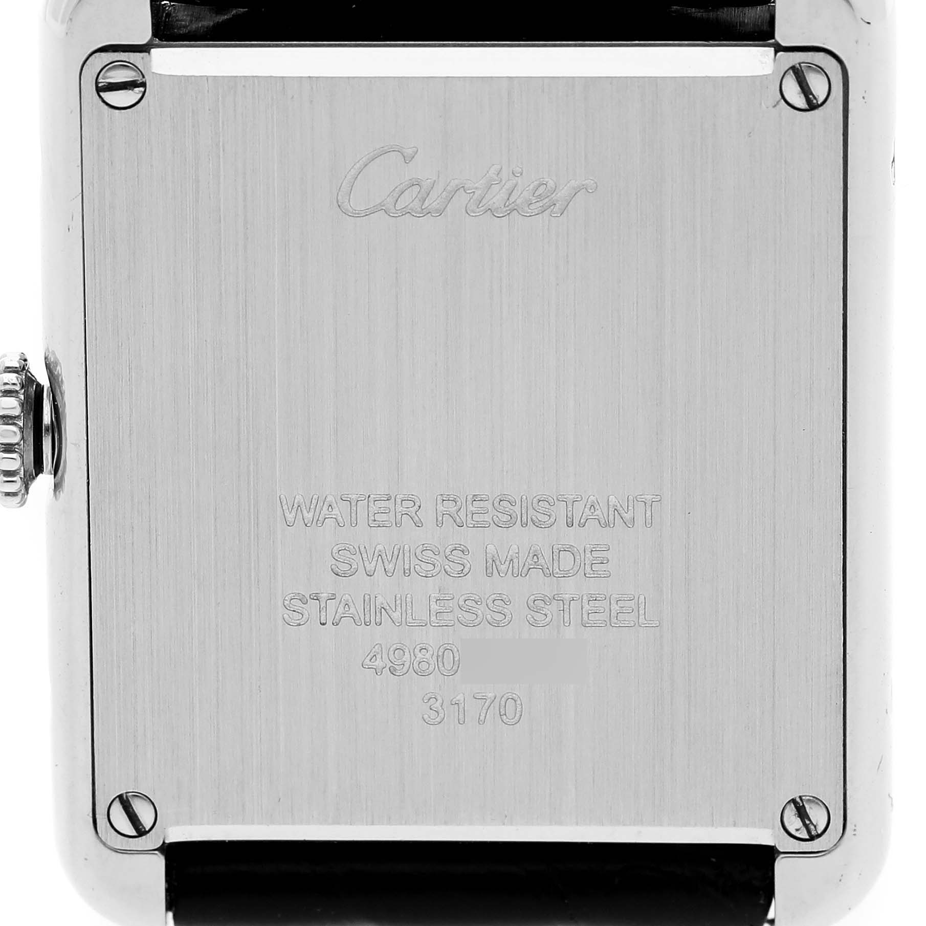 The image shows the back case of a Cartier Tank Solo W5200005 Women's Stainless Steel Silver Dial watch, highlighting engravings and screws.