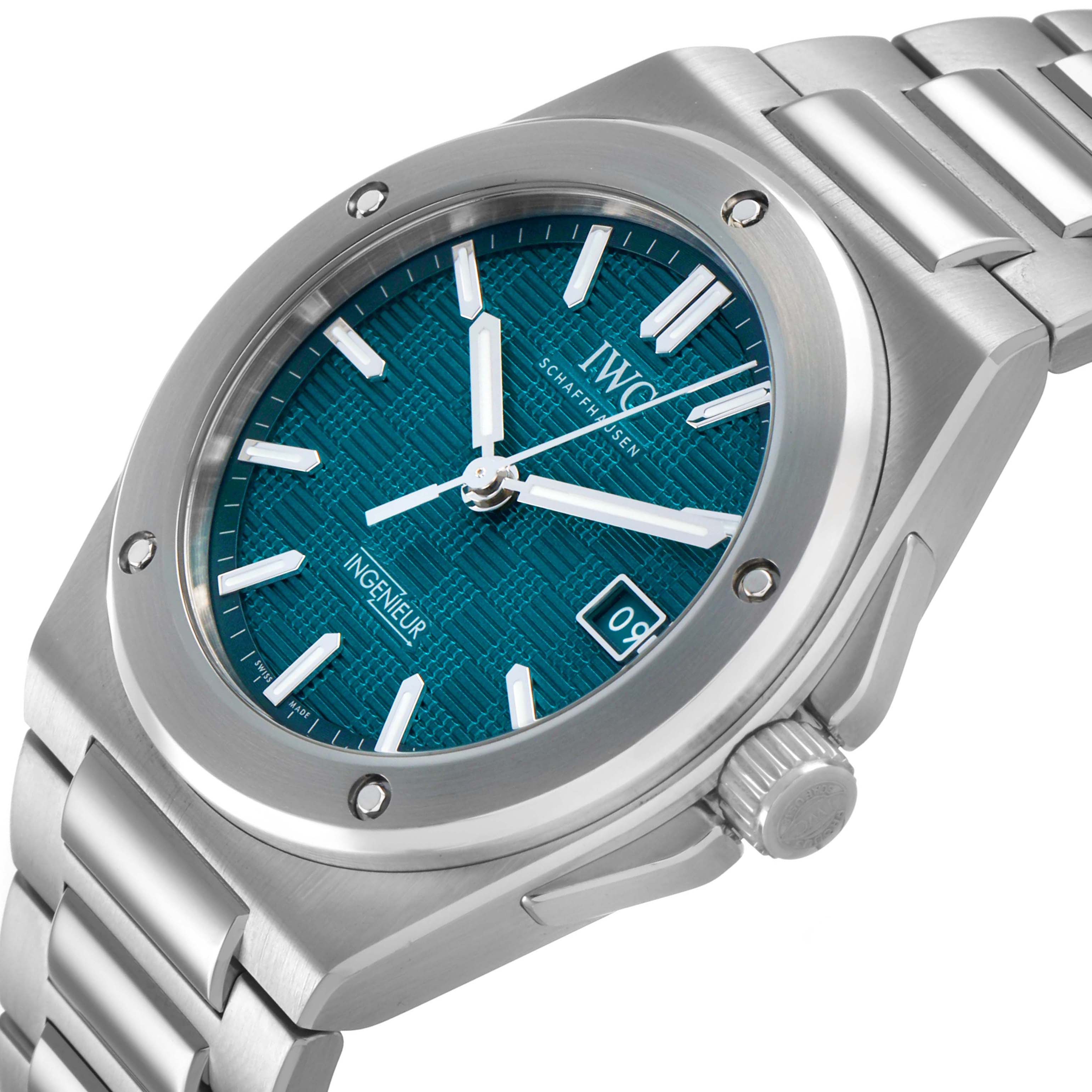 The IWC Ingenieur IW328903 Men's Stainless Steel Green Dial watch is shown at an angled close-up, highlighting the blue dial, date function, and stainless steel bracelet.