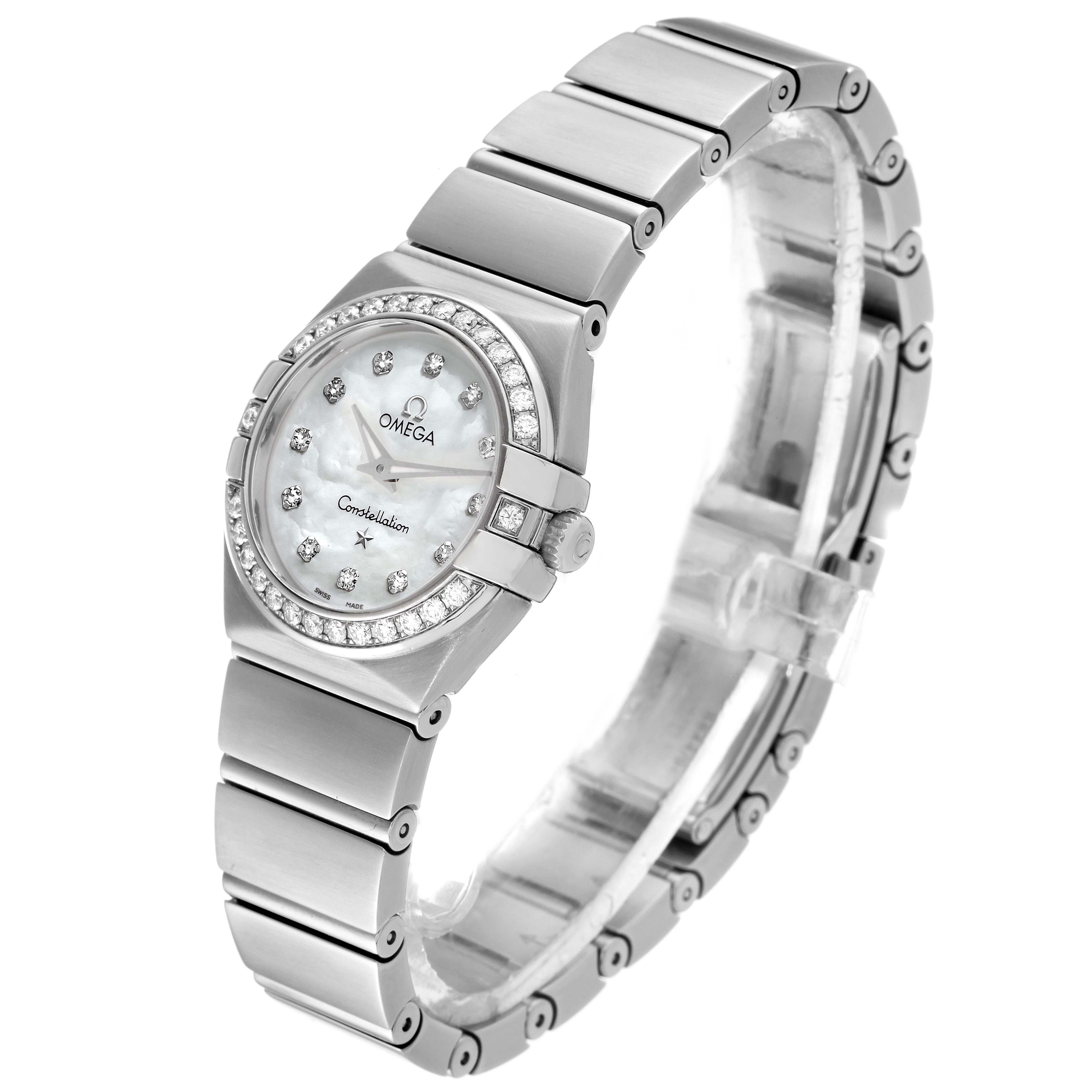 The image shows a side angle view of the Omega 123.15.24.60.55.003 Women's Stainless Steel Mother of Pearl Dial 123.15.24.60.55.003 Women's Stainless Steel Mother of Pearl Dial Constellation 24 Mother of Pearl Diamond Ladies Watch model 123.15.24.60.55.003 with a clear view of the dial, bezel, and bracelet.