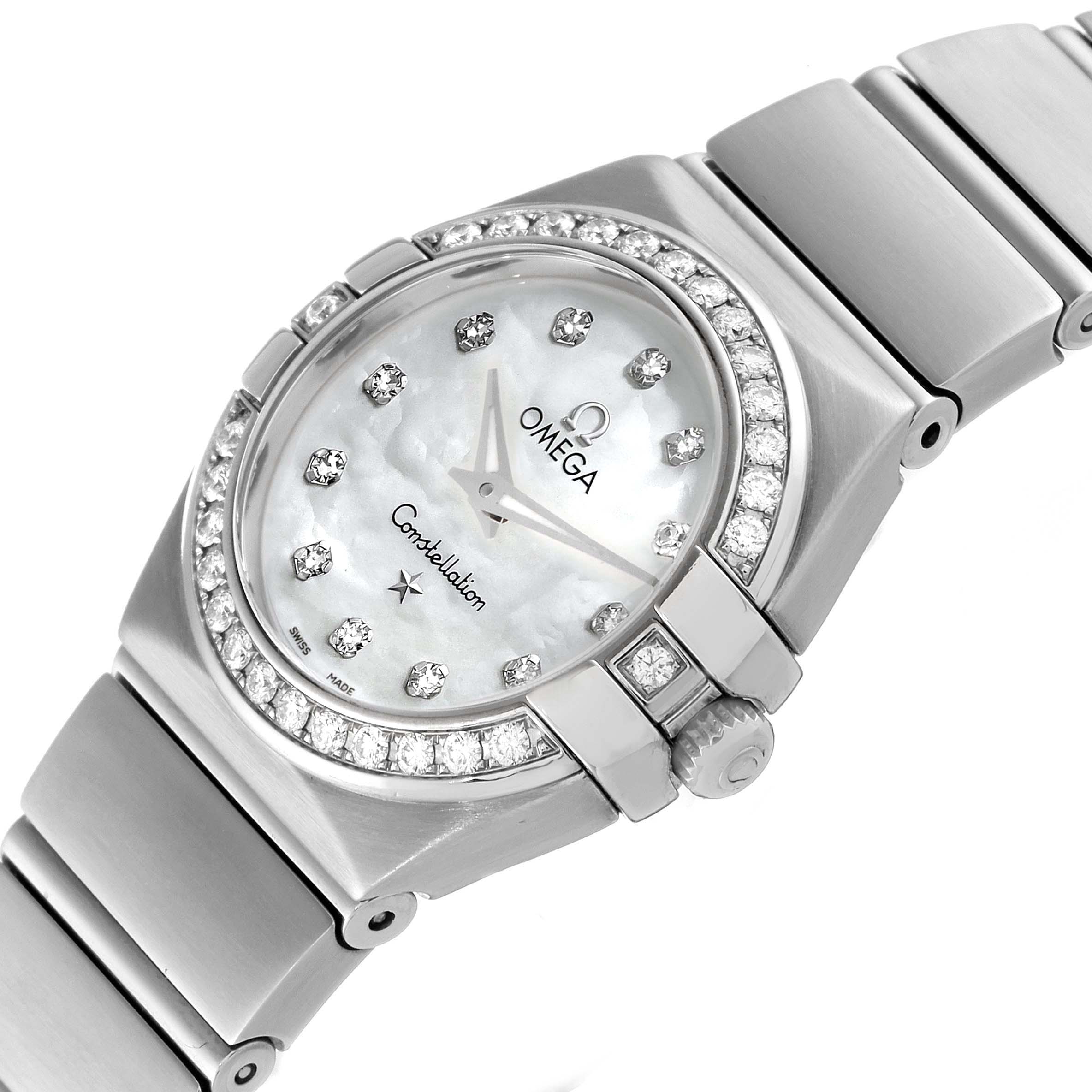 The image shows an angled top view of the Omega 123.15.24.60.55.003 Women's Stainless Steel Mother of Pearl Dial 123.15.24.60.55.003 Women's Stainless Steel Mother of Pearl Dial Constellation 24 Mother of Pearl Diamond Ladies Watch 123.15.24.60.55.003, focusing on the dial and bracelet.