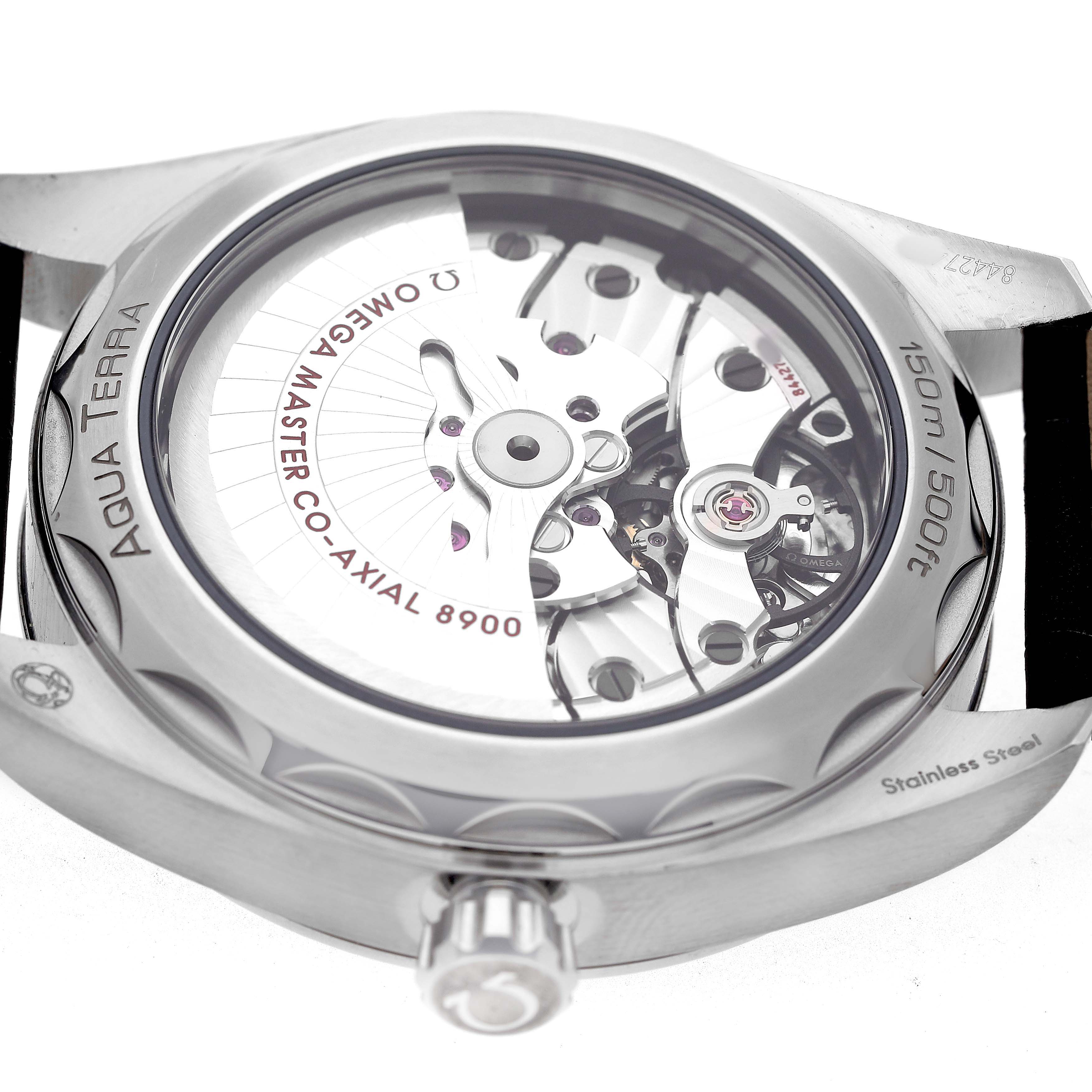 The image shows the back of the Omega Aqua Terra 220.13.41.21.10.001 Men's Stainless Steel Green Dial watch, highlighting the Master Co-Axial 8900 movement and markings.