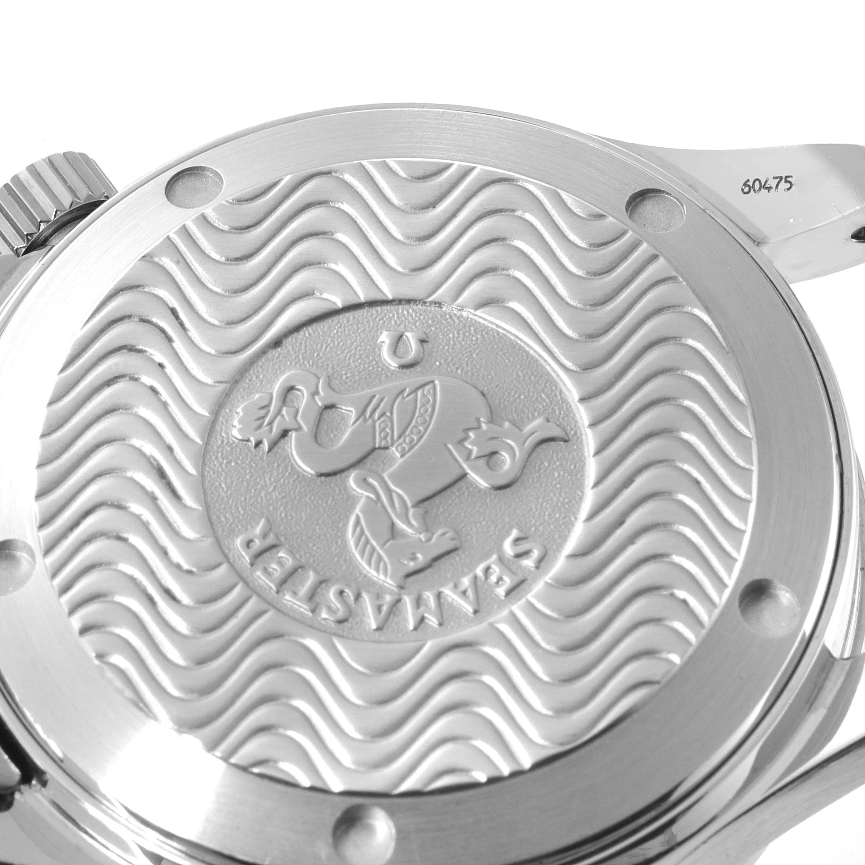 This image shows the back case of an Omega Seamaster 2551.80.00 Men's Stainless Steel Blue Dial 2551.80.00 Men's Stainless Steel Blue Dial watch, featuring engraved waves and a seahorse emblem.